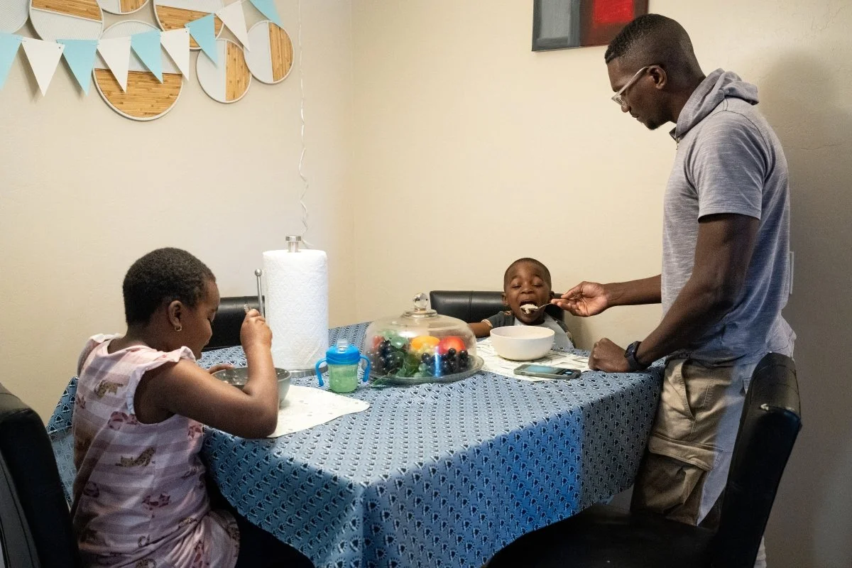 Tucson family eating breakfast during a family photography session.