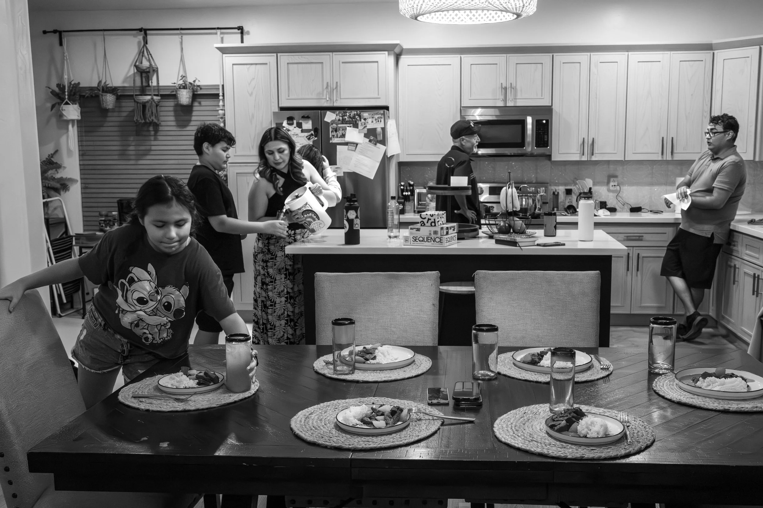 A family making dinner during a Tucson family photography session.