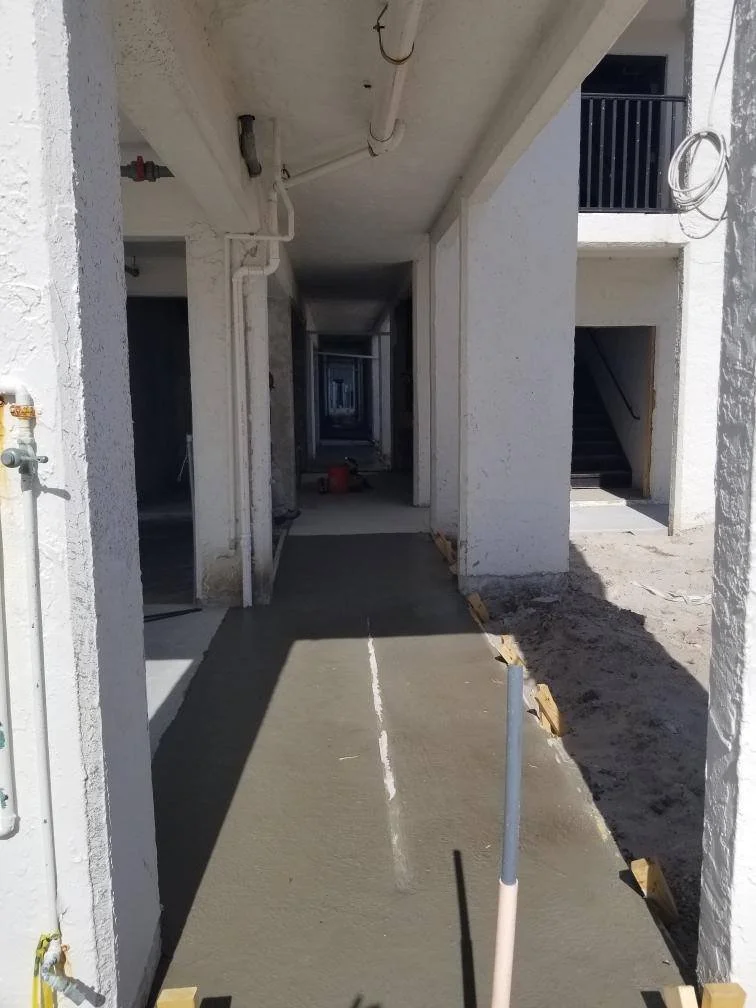 cement by bathrooms.jpg