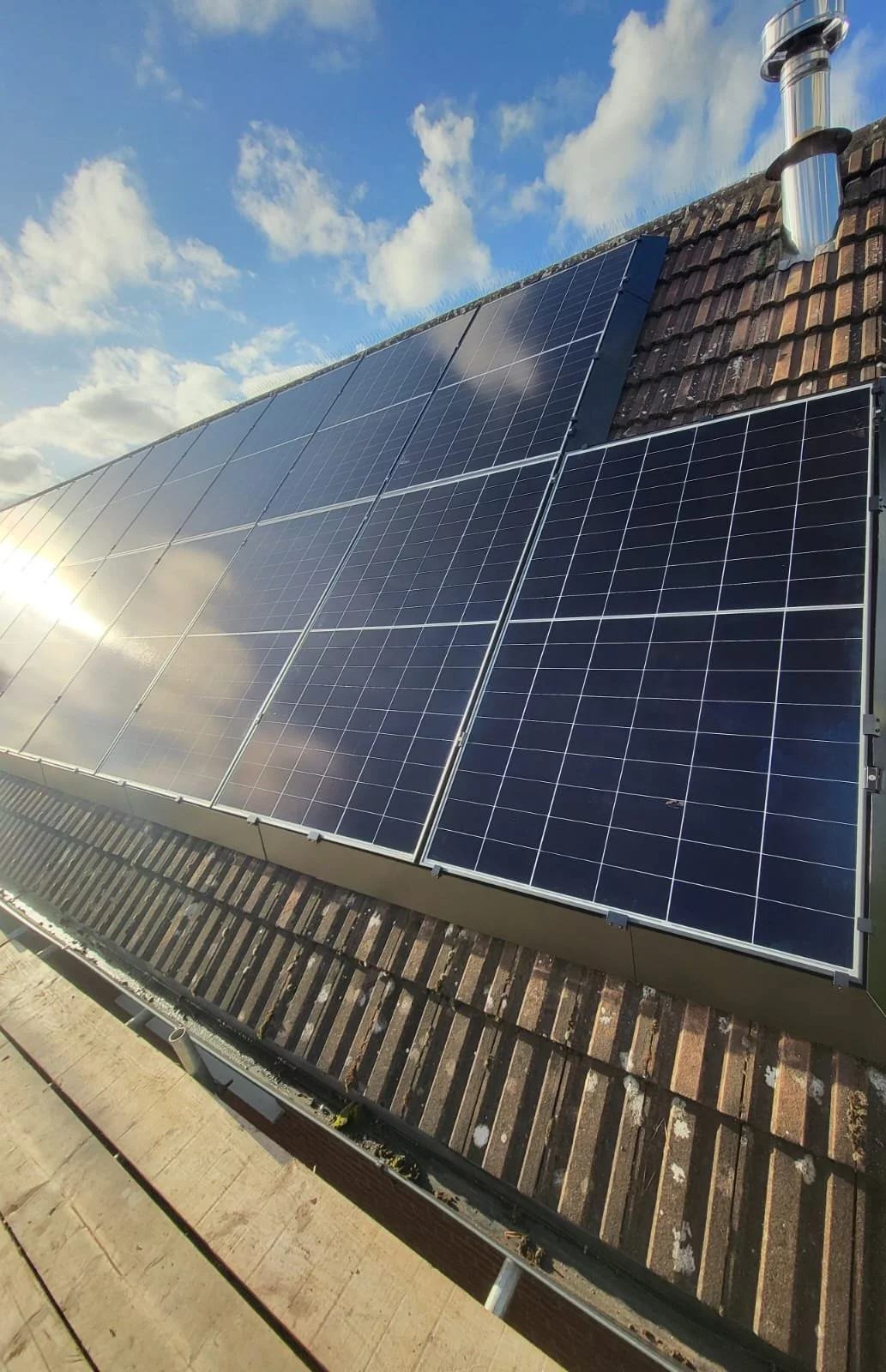 Modern solar panels installed with SolaSkirt bird protection