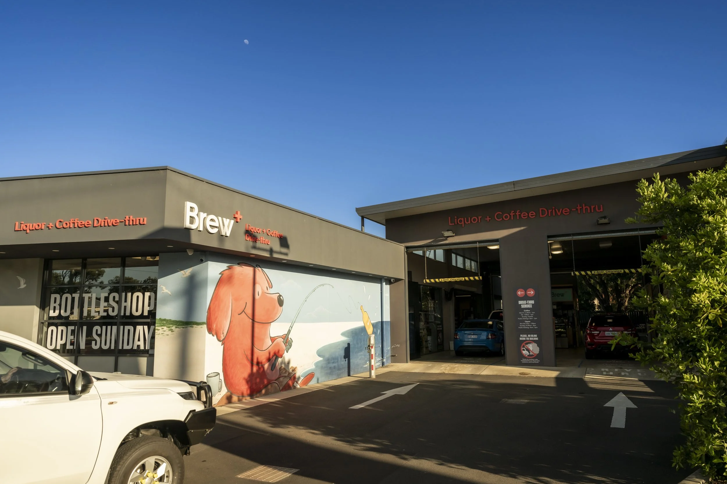 Exterior of Brew Plus bottle shop in Busselton featuring liquor and coffee drive-thru and Sunday trading hours