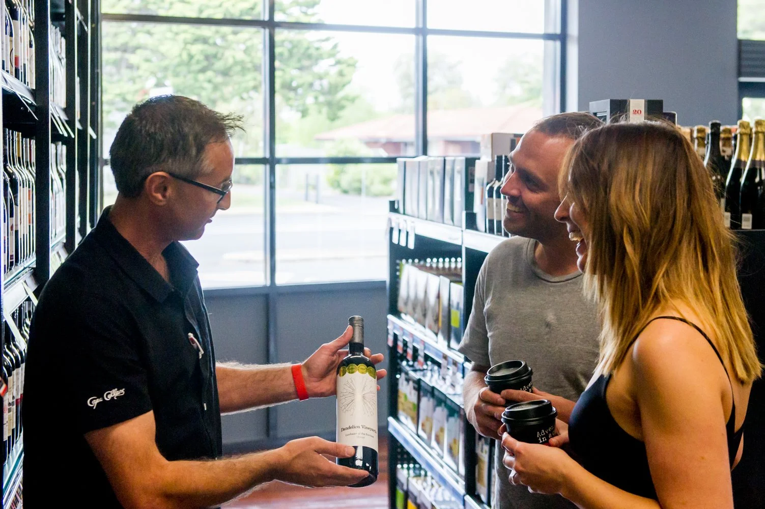 Brew Plus bottle shop staff assisting customers with wine selection in Busselton, WA