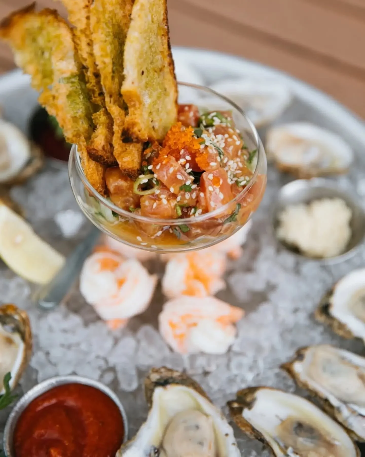 A platter made for sharing&hellip; or keeping all to yourself 🦪🍤

Our Cold Bar Platter comes with a dozen oysters, steamed shrimp, spicy tuna, crostini, cocktail sauce, and horseradish. Ready to dive in? Book your table at stirgreenville.com ✨