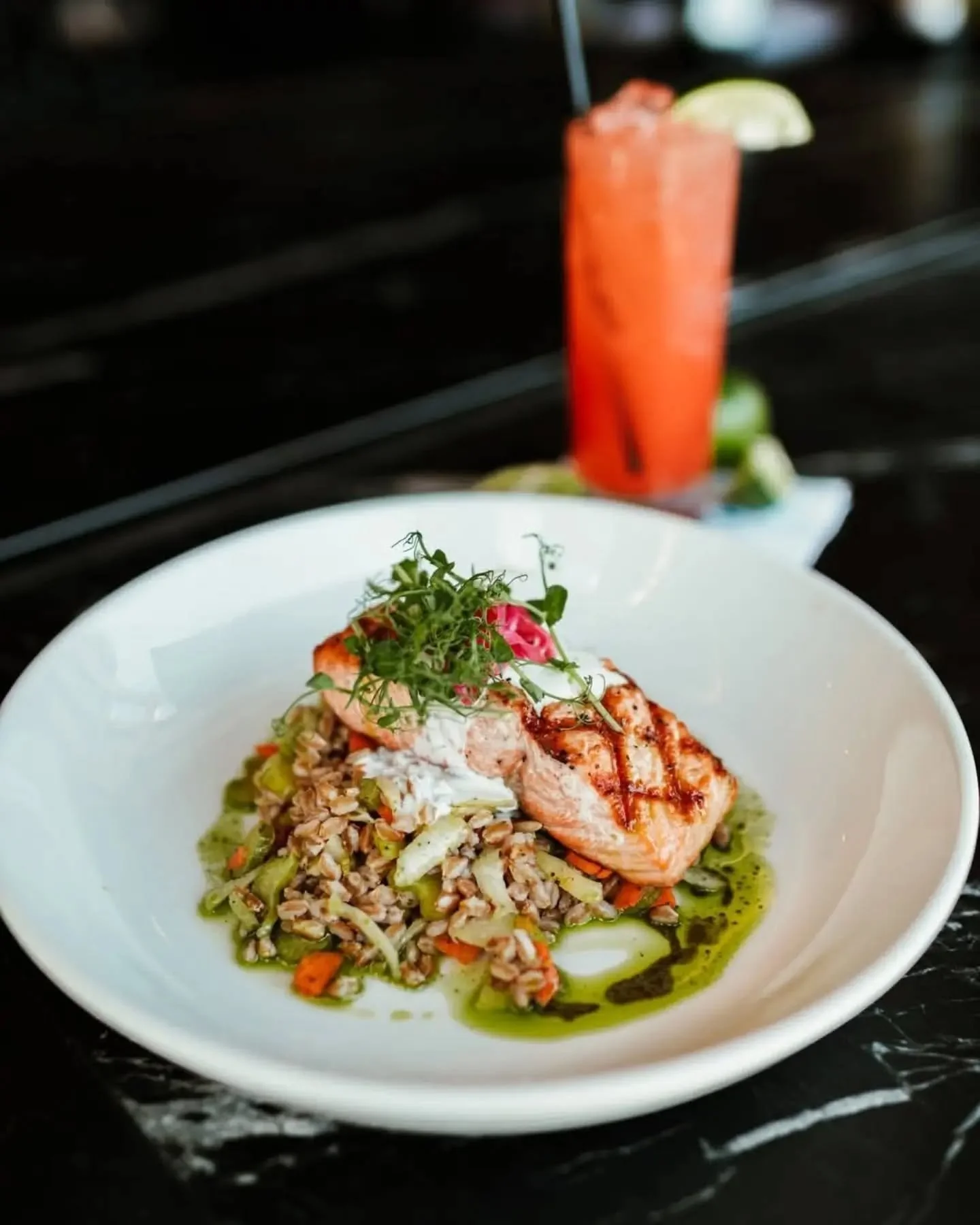 Our Grilled Salmon is a customer favorite that speaks for itself. 🐟

Served over farro and roasted vegetables, and topped with pickled red onions and a citrus dill sauce. A dish that looks incredible and tastes even better. 👏

Reservations availabl