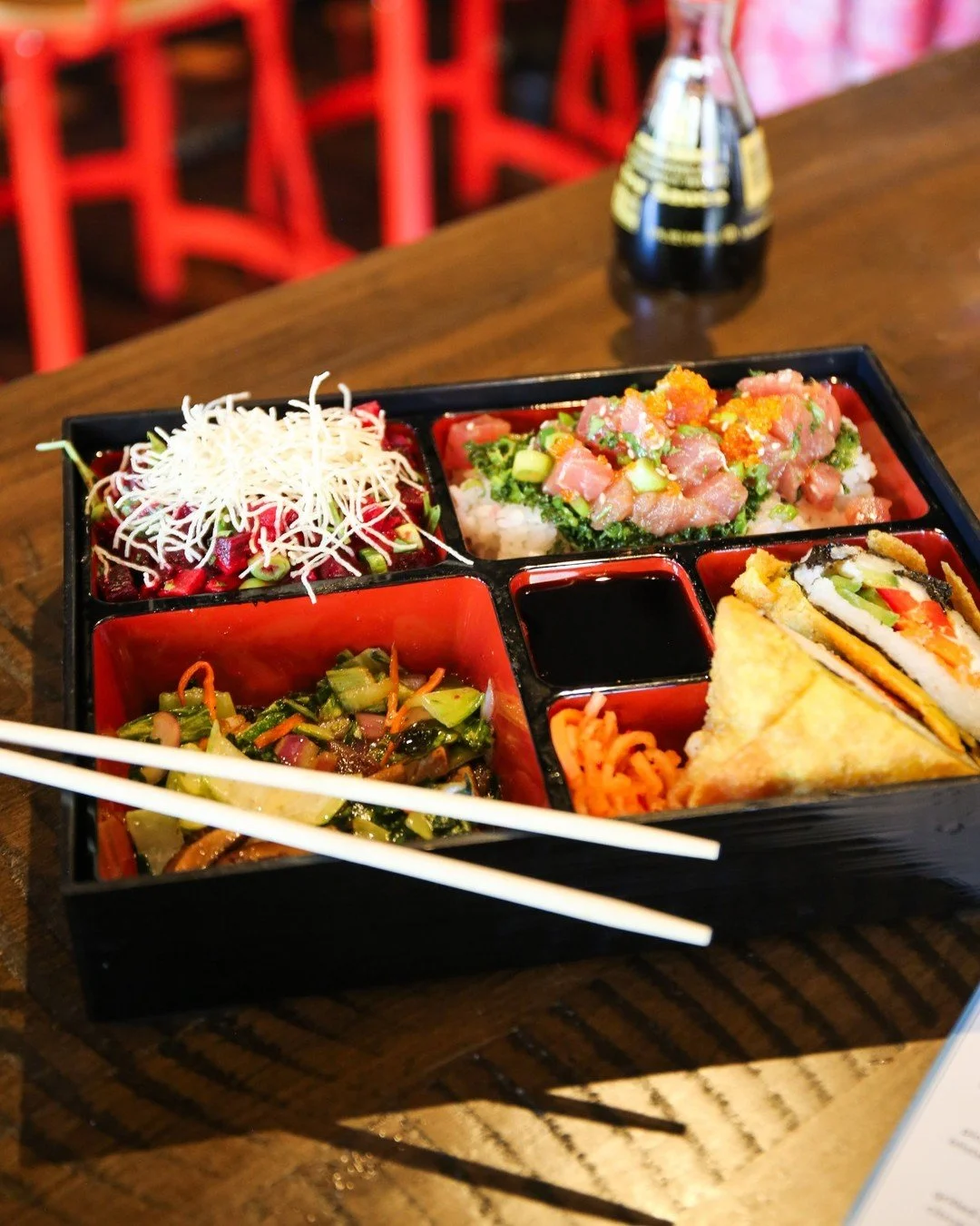 A lineup of bold bites, all in one box 🥢

Our Bento Sampler brings a little bit of everything to the table &mdash; tuna poke with tobiko, miso kale salad, a fried sushi egg roll, edamame salad, seasoned vegetables, and citrus soy&ndash;marinated bee