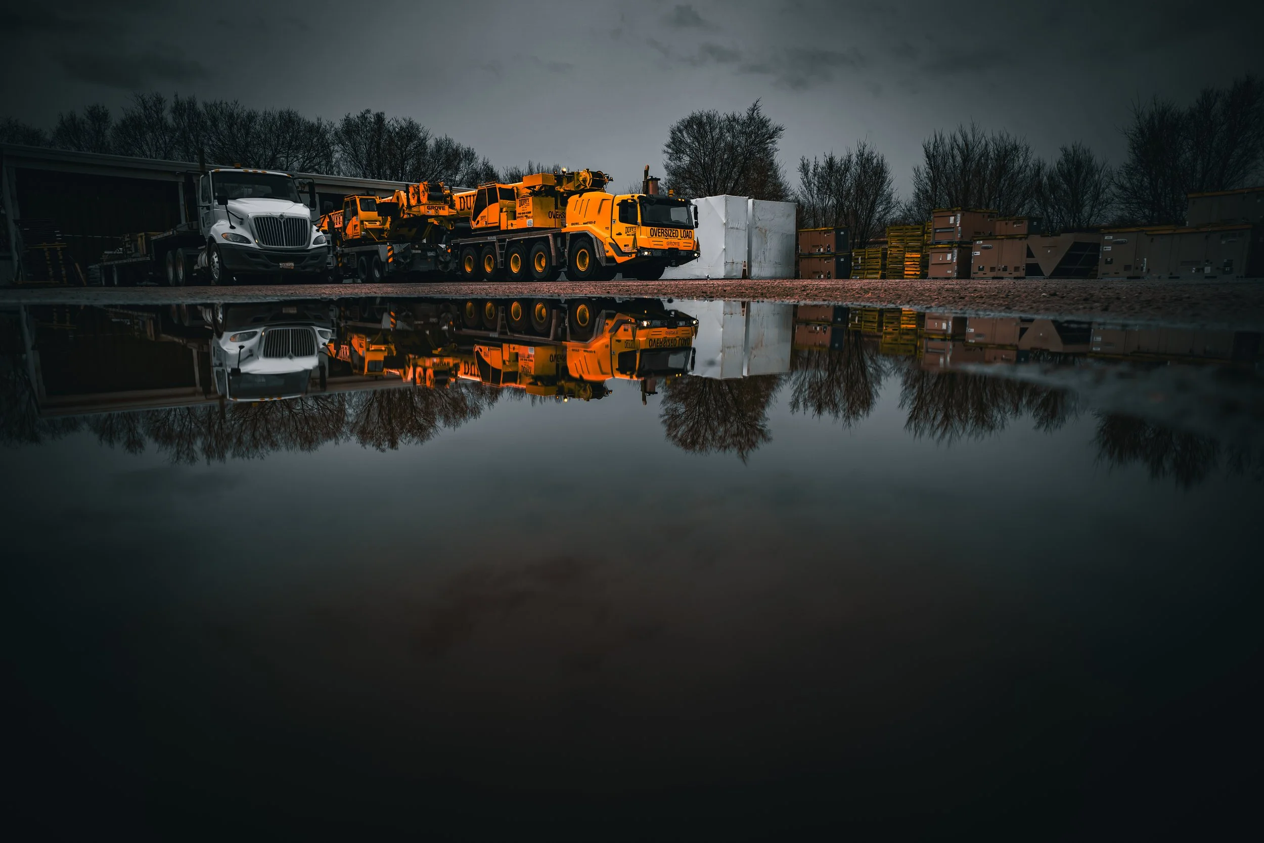 Crane Service - 112 Puddle Reflection