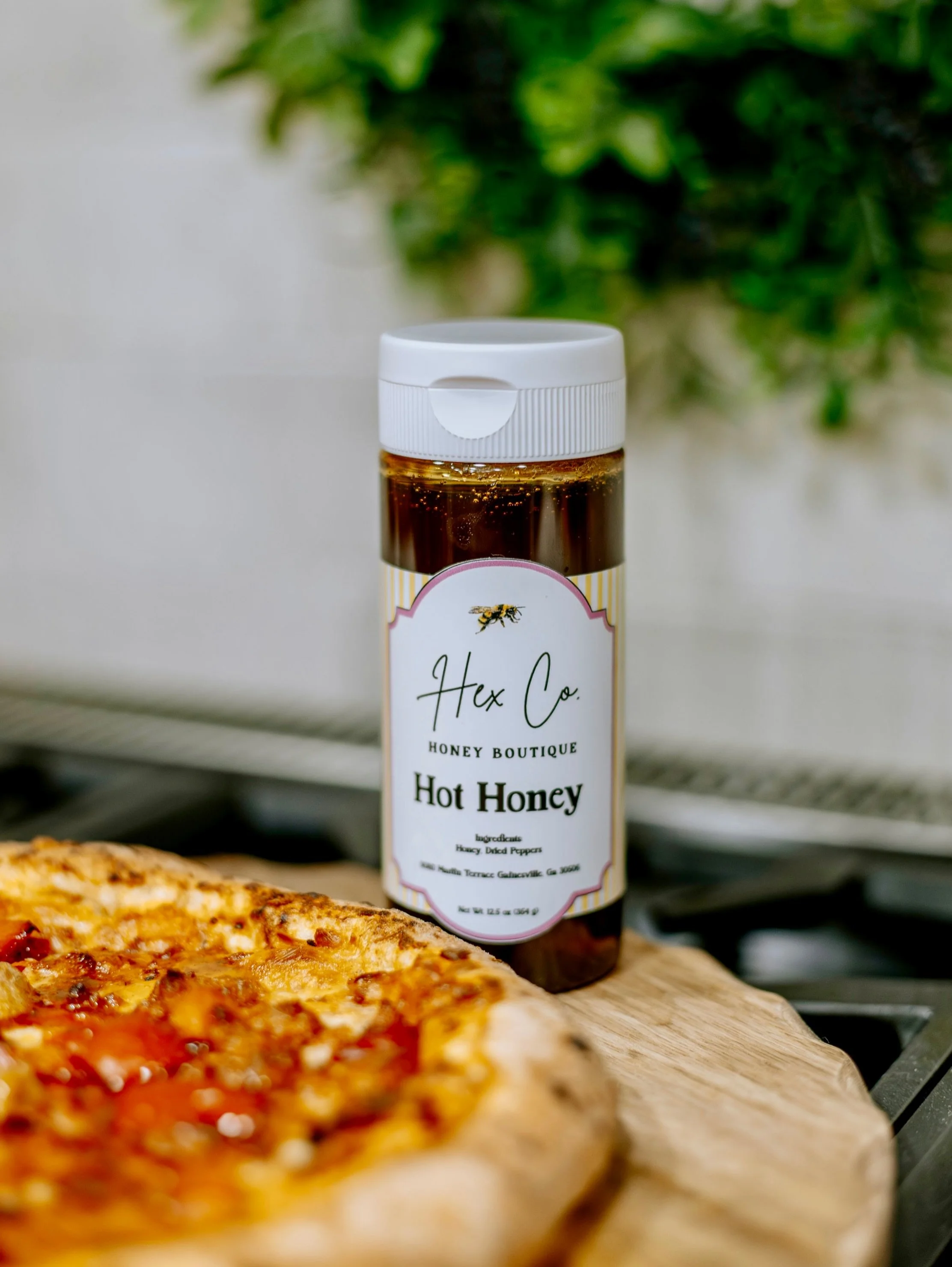 Golden, glossy and unapologetically bold!

Hex Co. Hot Honey begins with the delicate sweetness of Georgia honey, followed by a punch of warmth that lingers just long enough. It drapes over a hot slice, sinking into every crisp edge and bubbling pock