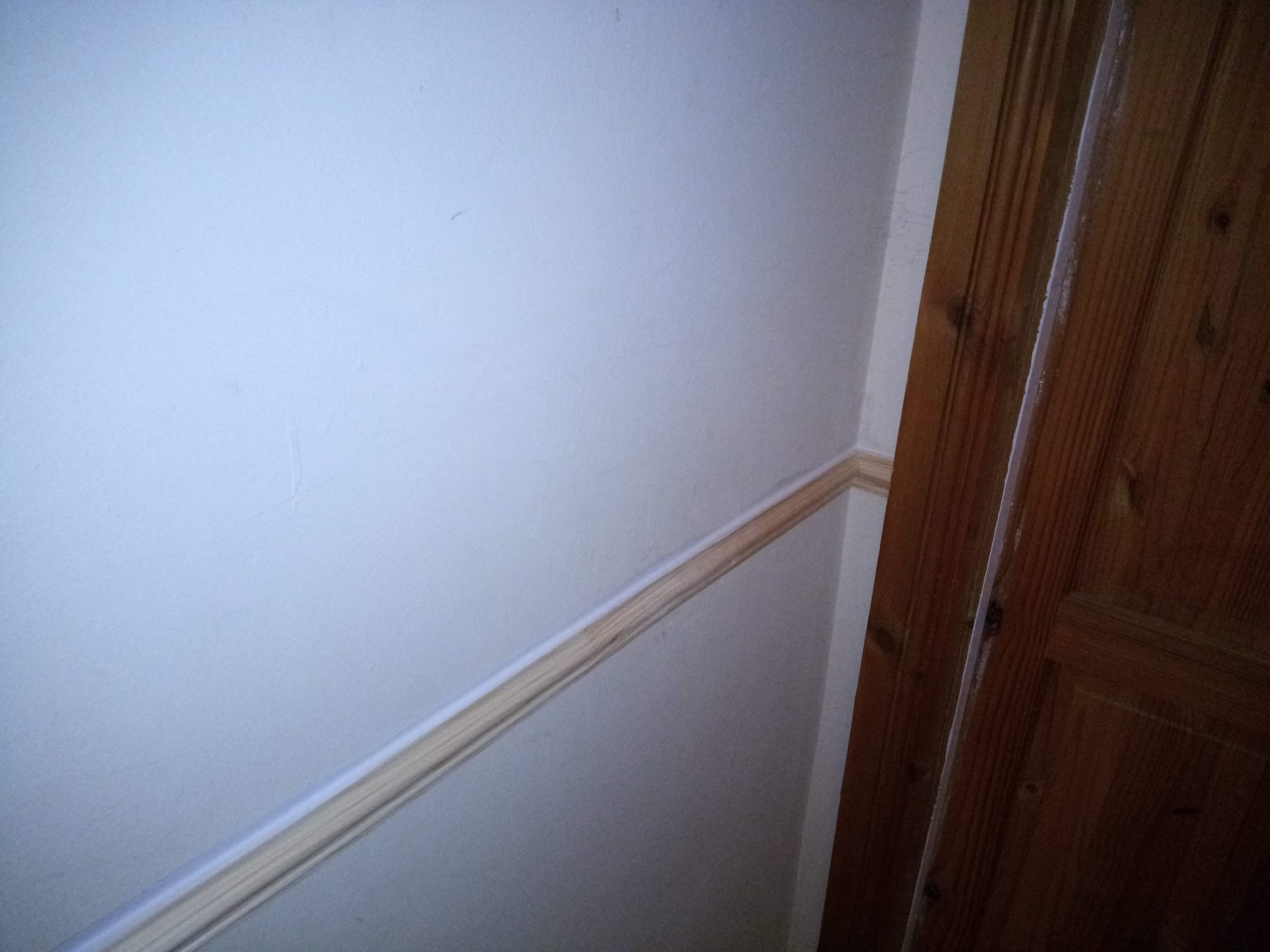 Dado rail fitted to hallway and stairs