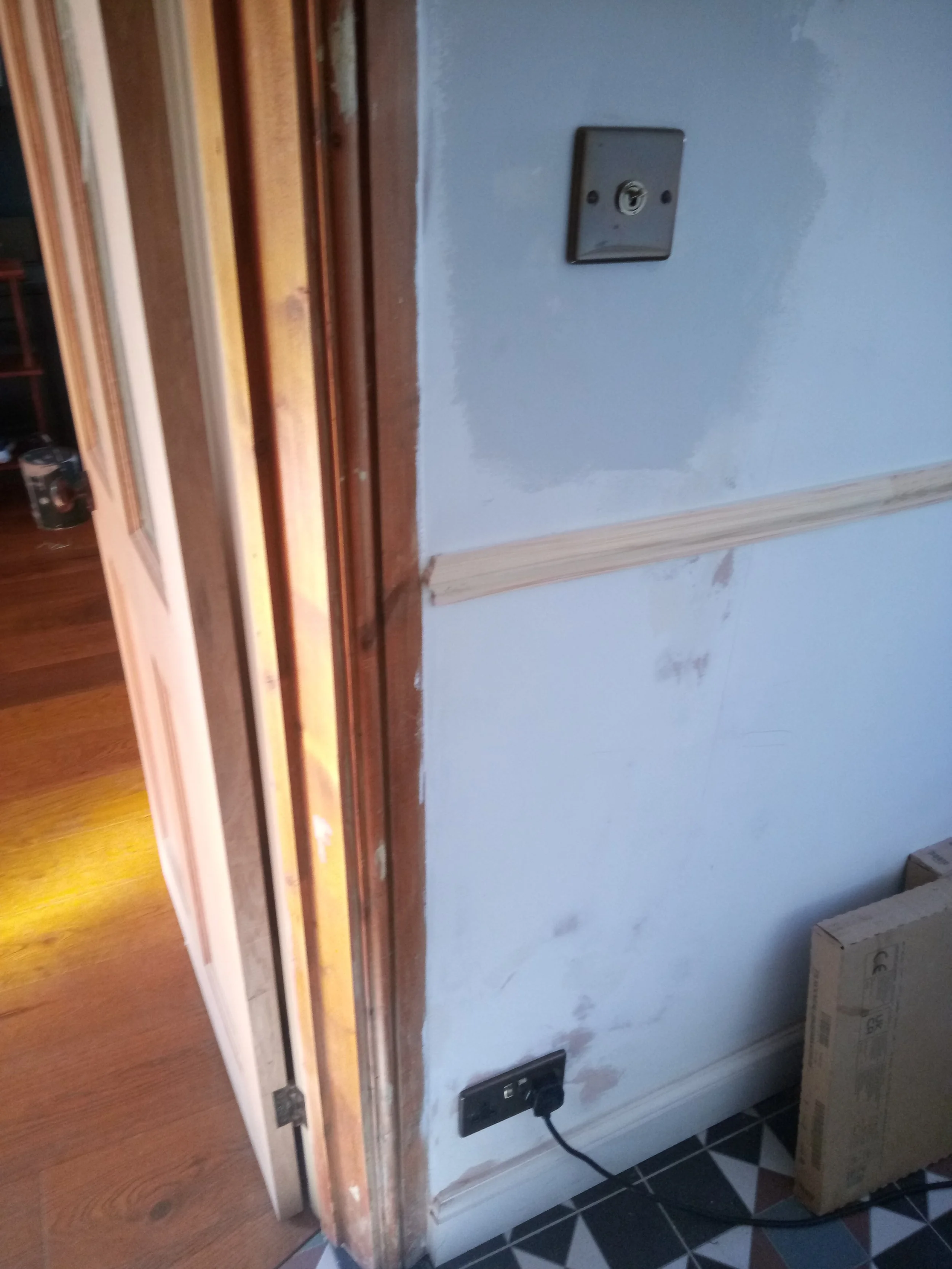 Dado rail fitted to hallway and stairs