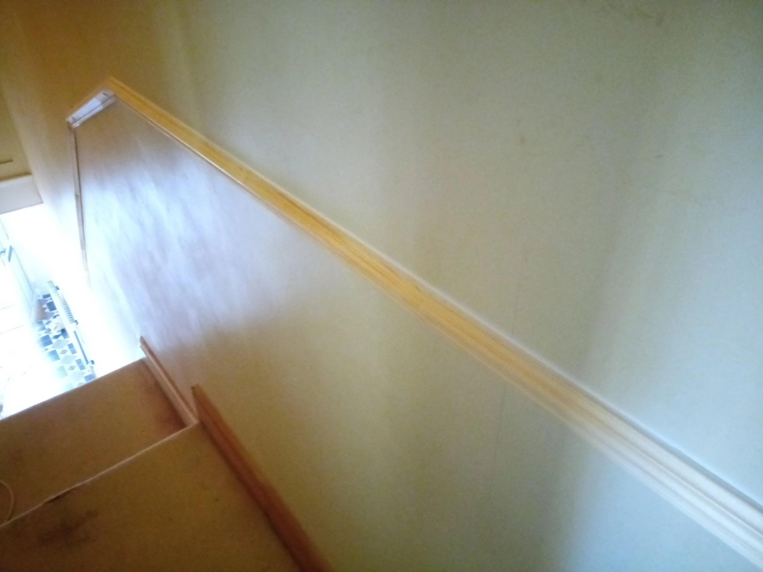 Dado rail fitted to hallway and stairs
