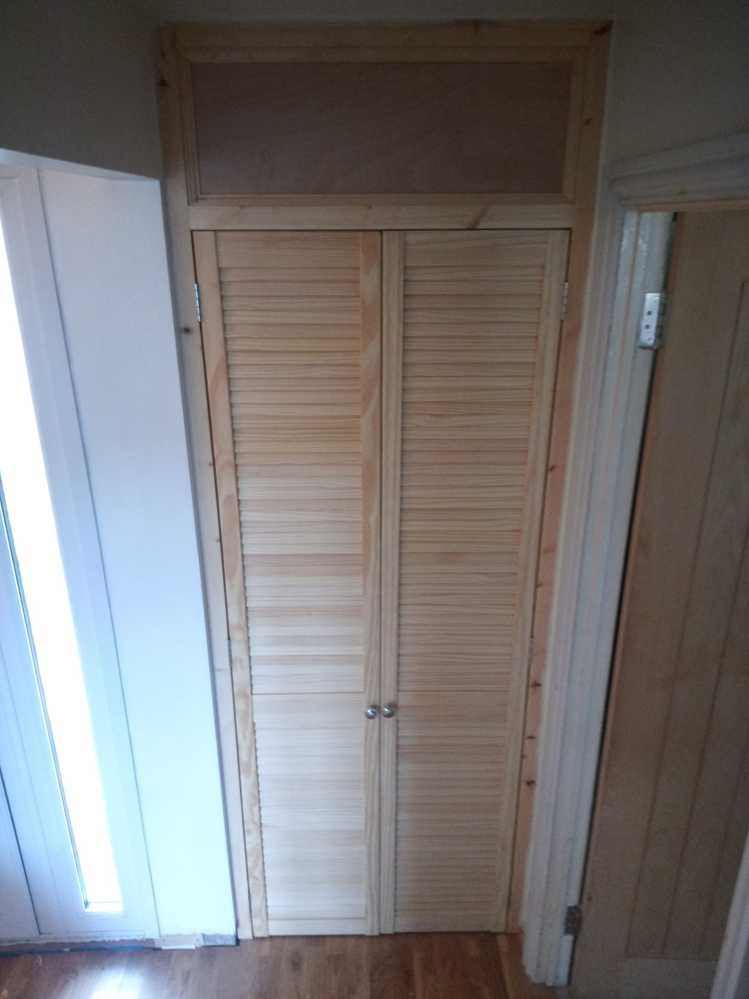 Cupboard with louvred doors