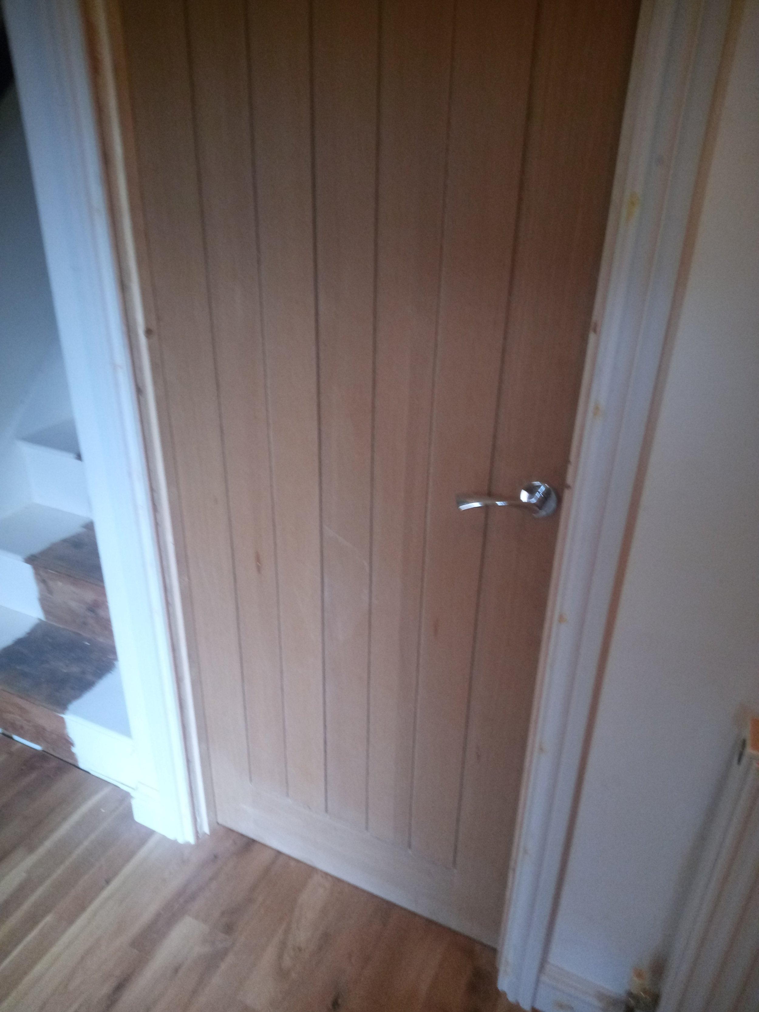 Oak door hung, architrave and skirting fitted