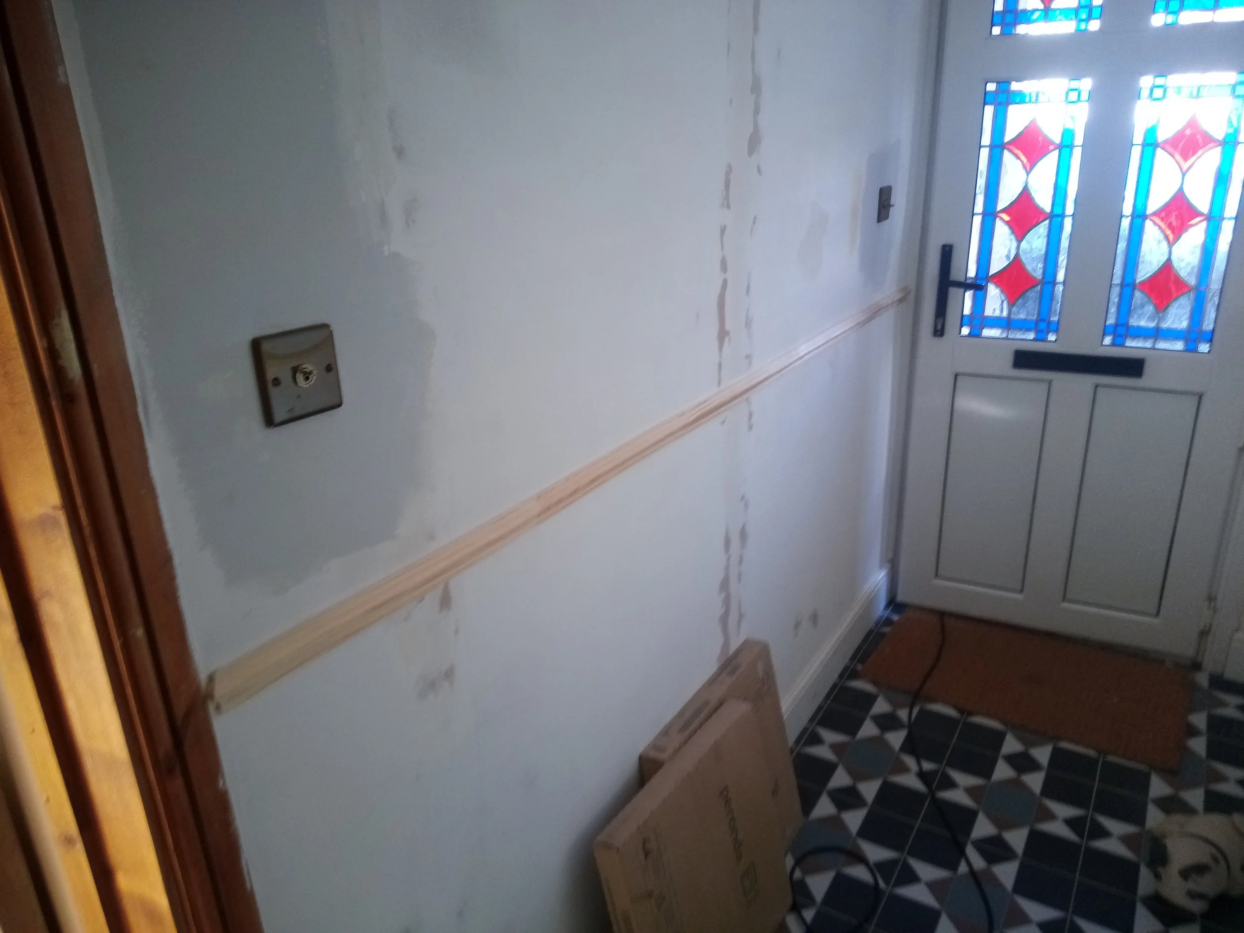 Dado rail fitted to hallway and stairs