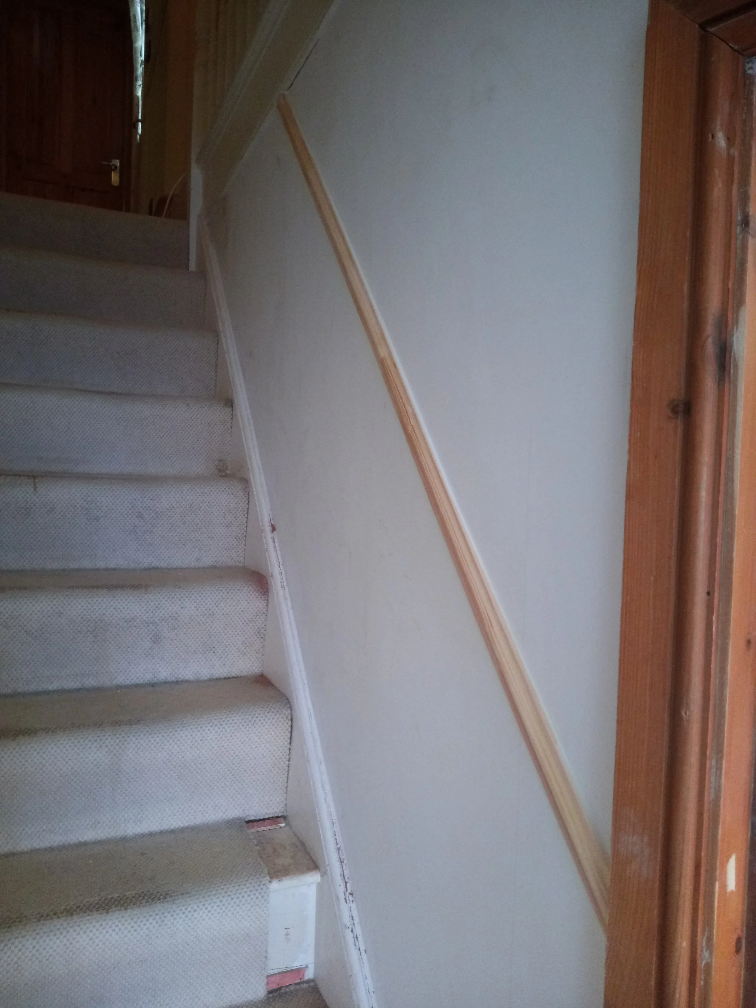 Dado rail fitted to hallway and stairs