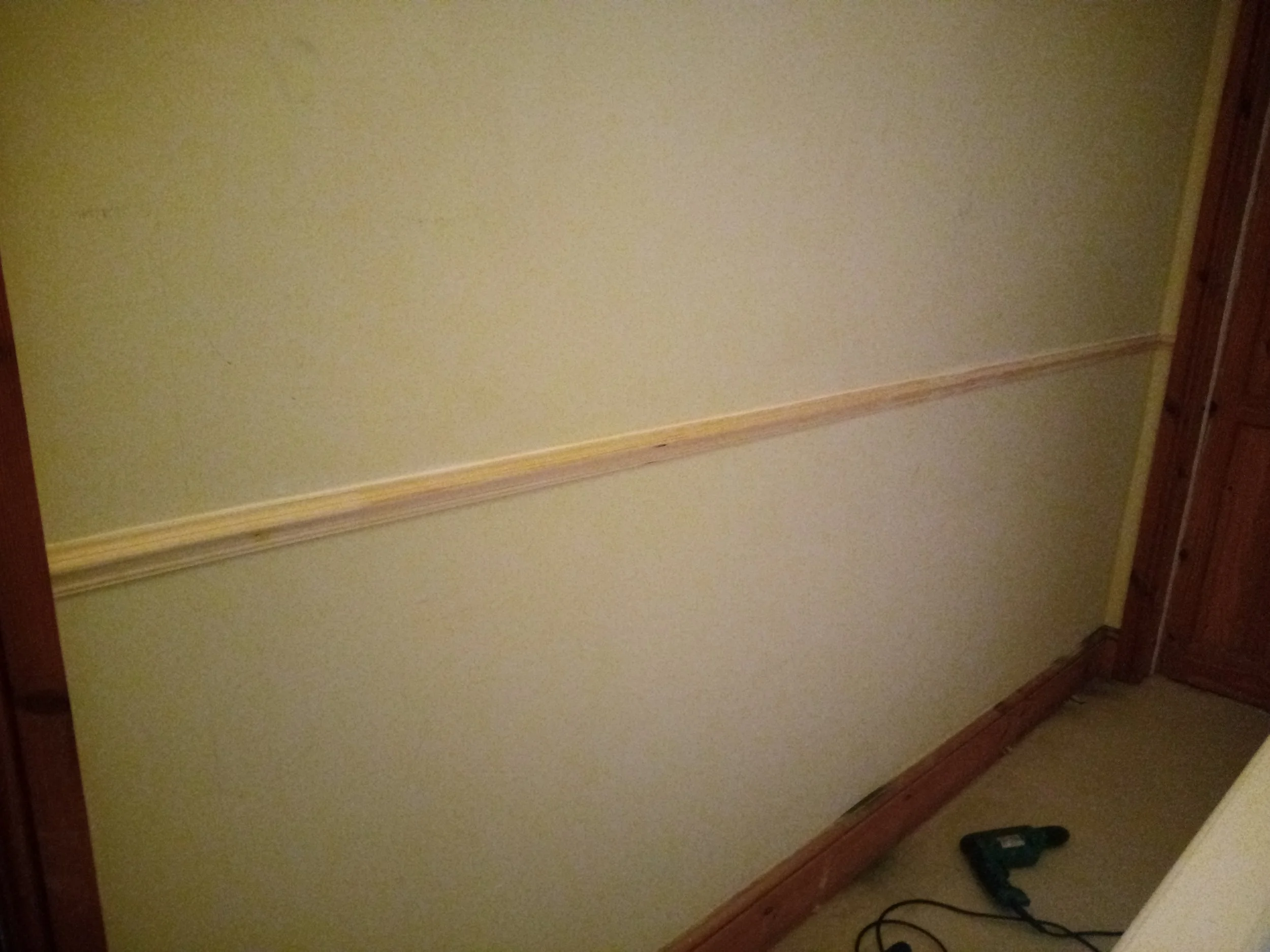 Dado rail fitted to hallway and stairs