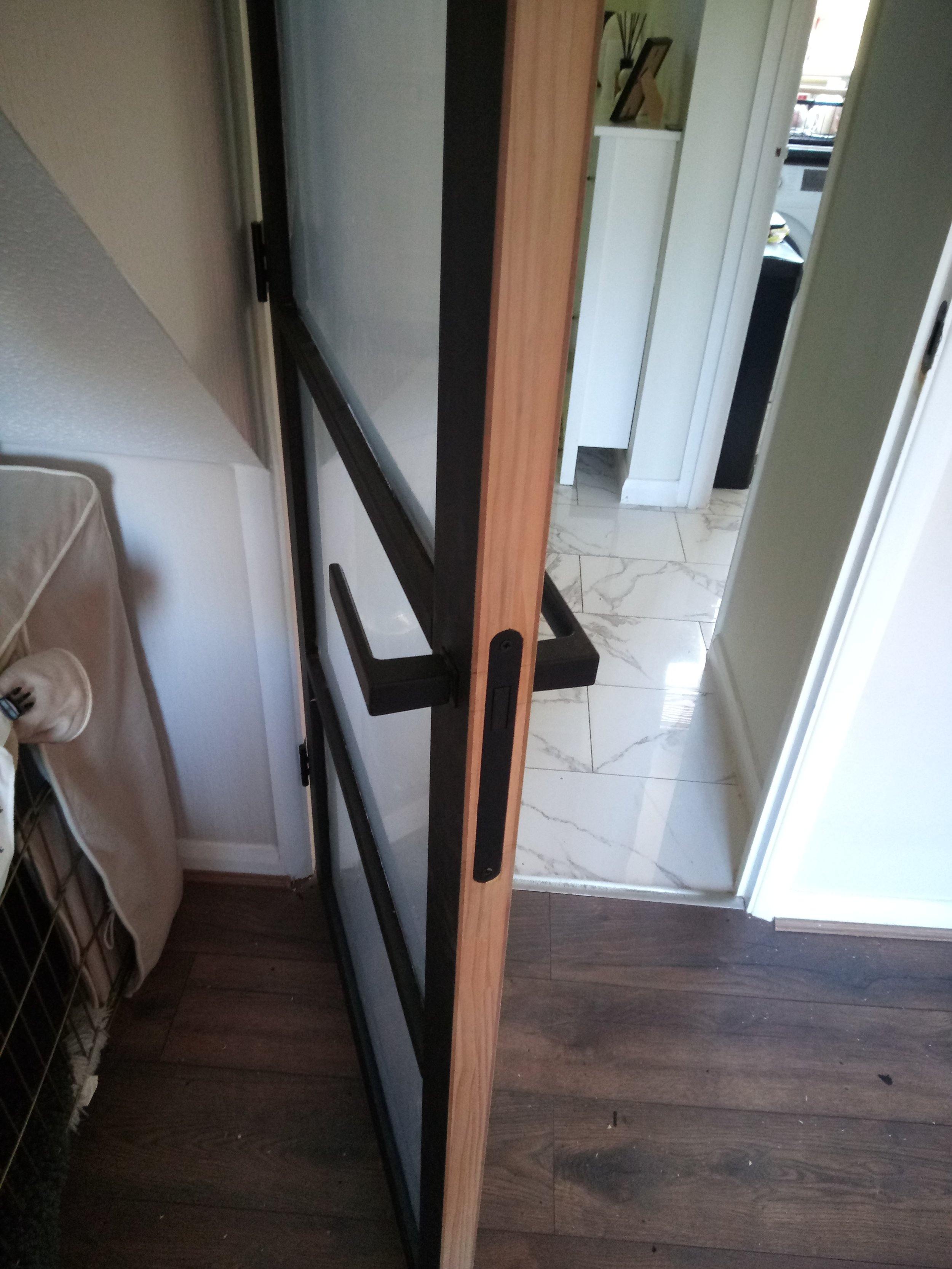 Black glass panelled door
