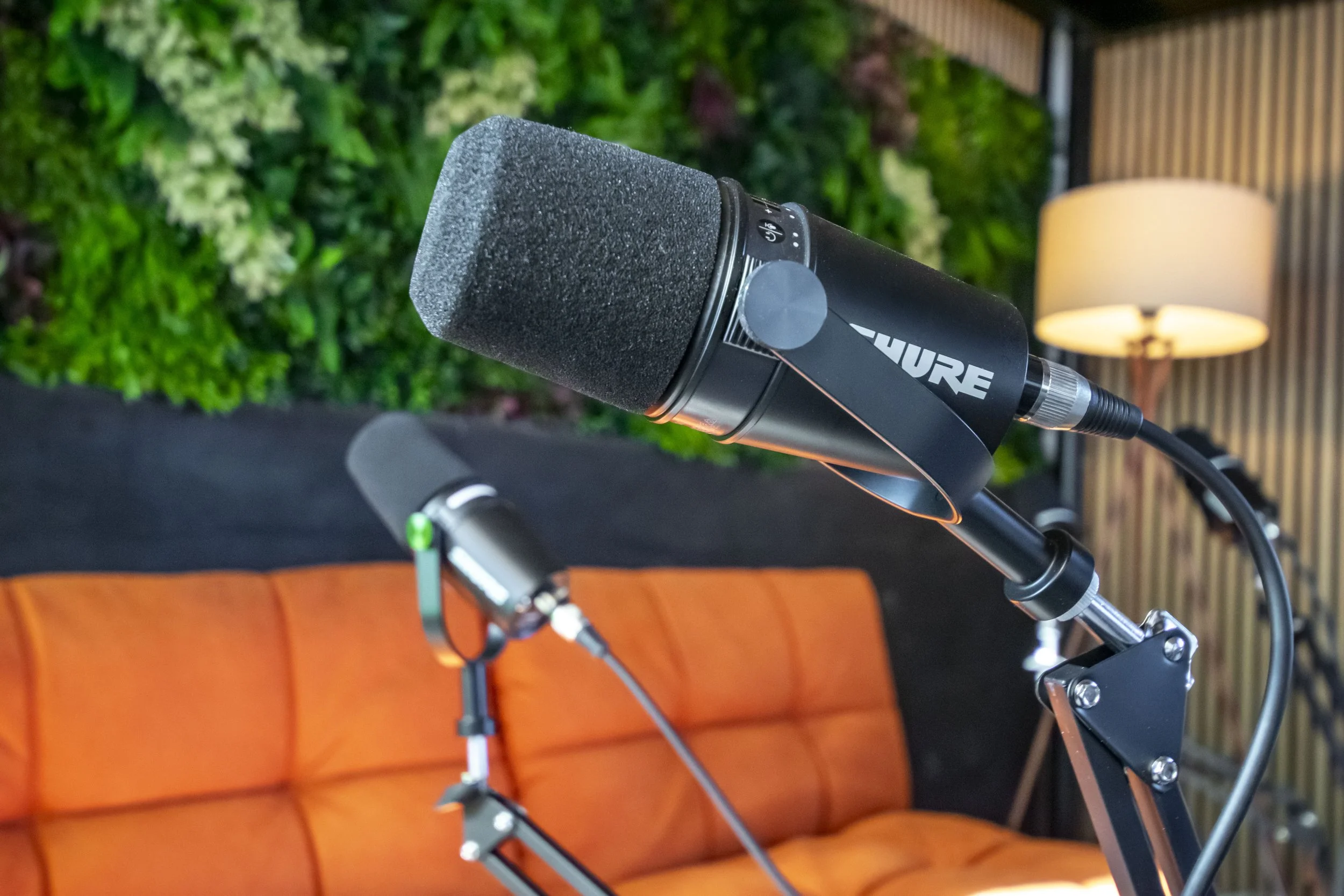 Shure SM7B broadcast microphones with professional lighting in Short Form Studios podcast recording studio in Watford