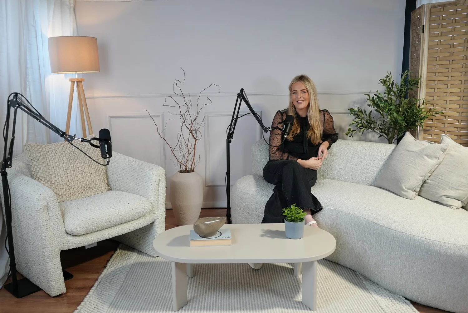 Studio 2 lifestyle podcast recording at Short Form Studios featuring relaxed living room setup with cream sofas, professional microphone and natural lighting in Watford