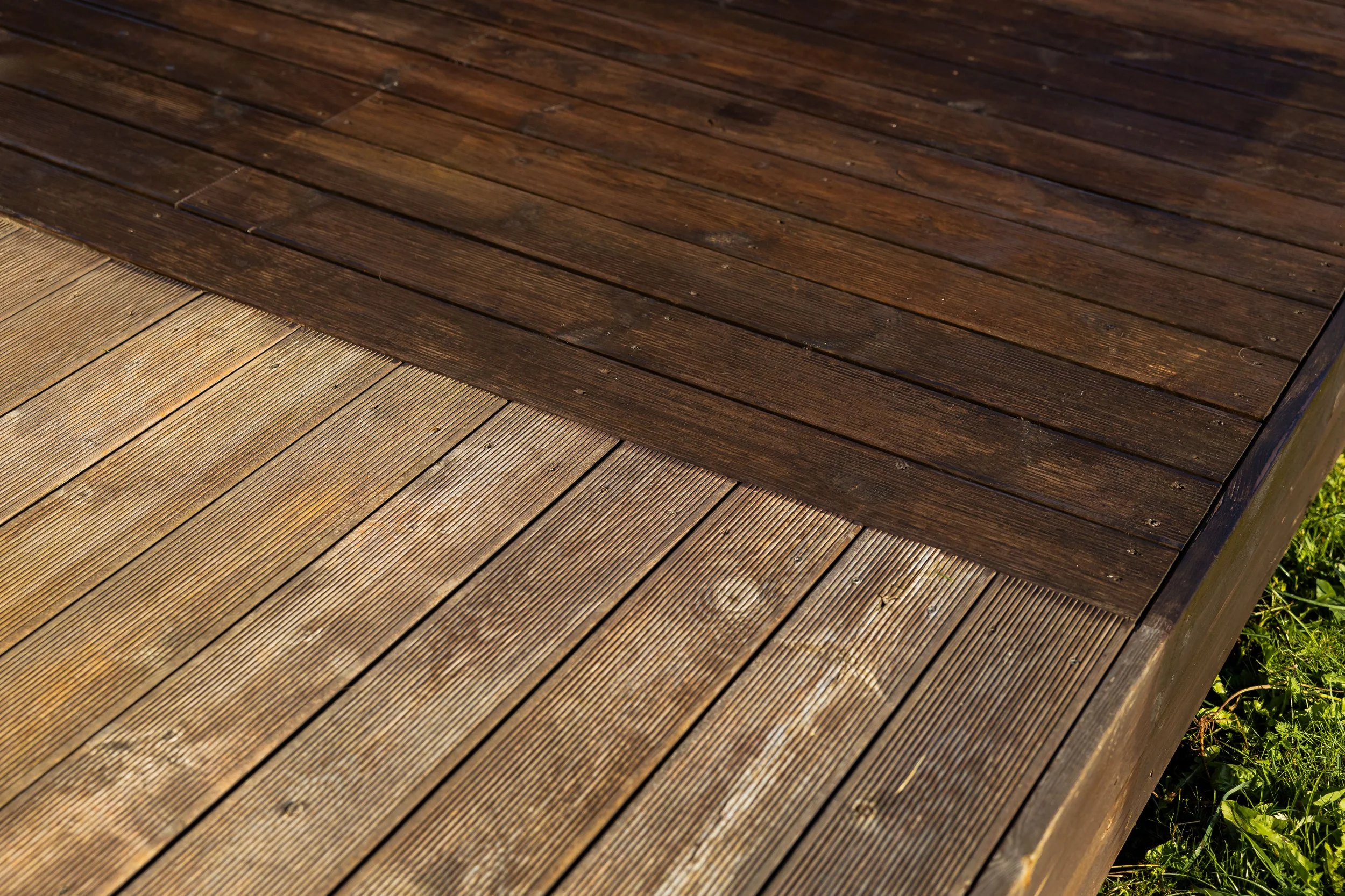 vecteezy_decking-boards-before-and-after-painting_48942981.jpg