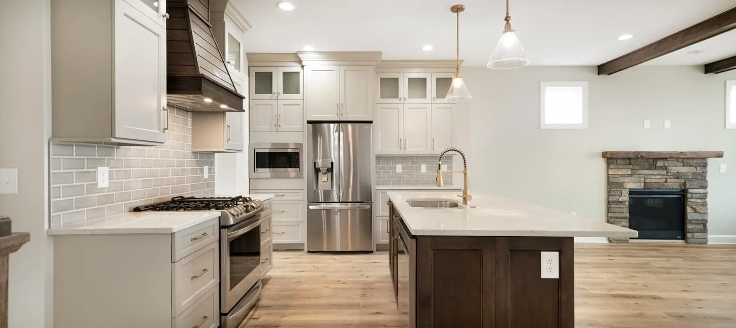 White kitchen cabinets with dark glazed island
