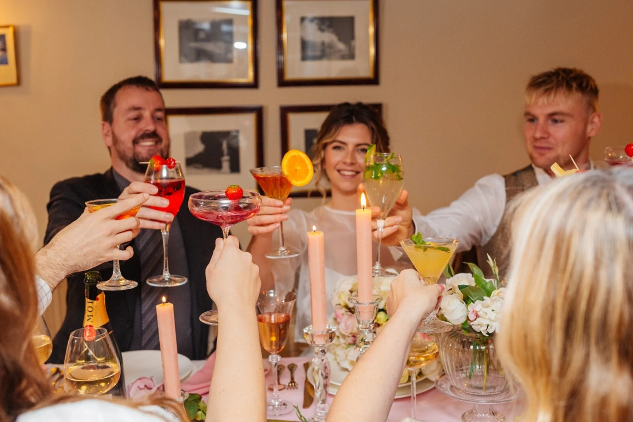 Saying cheers at intimate wedding breakfast.jpg