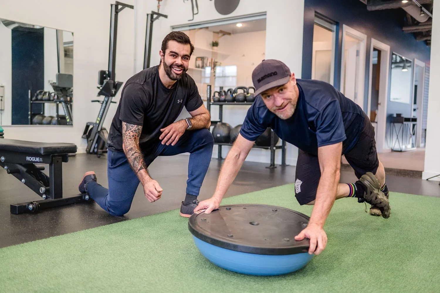 Personal trainer coaching a client in his first personal training session at Life Studio in North Vancouver.