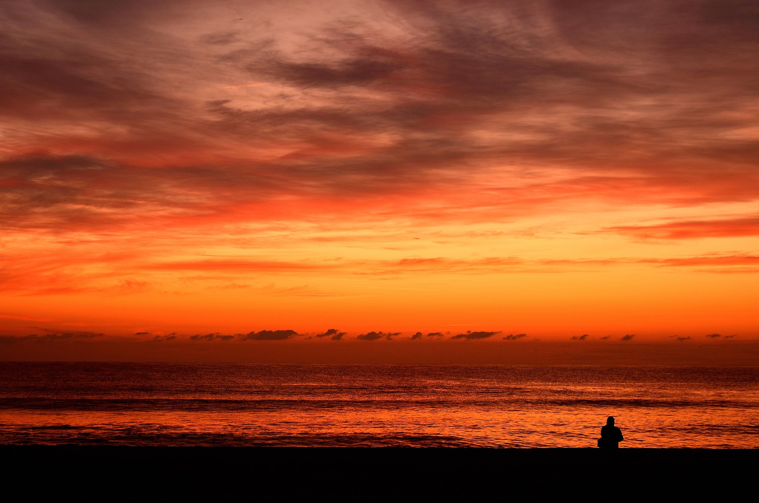 "Fisherman Red" ~ The silhouette of a lone fisherman begins his day with the solace and beauty of nature. (Seaside Heights, New Jersey)
