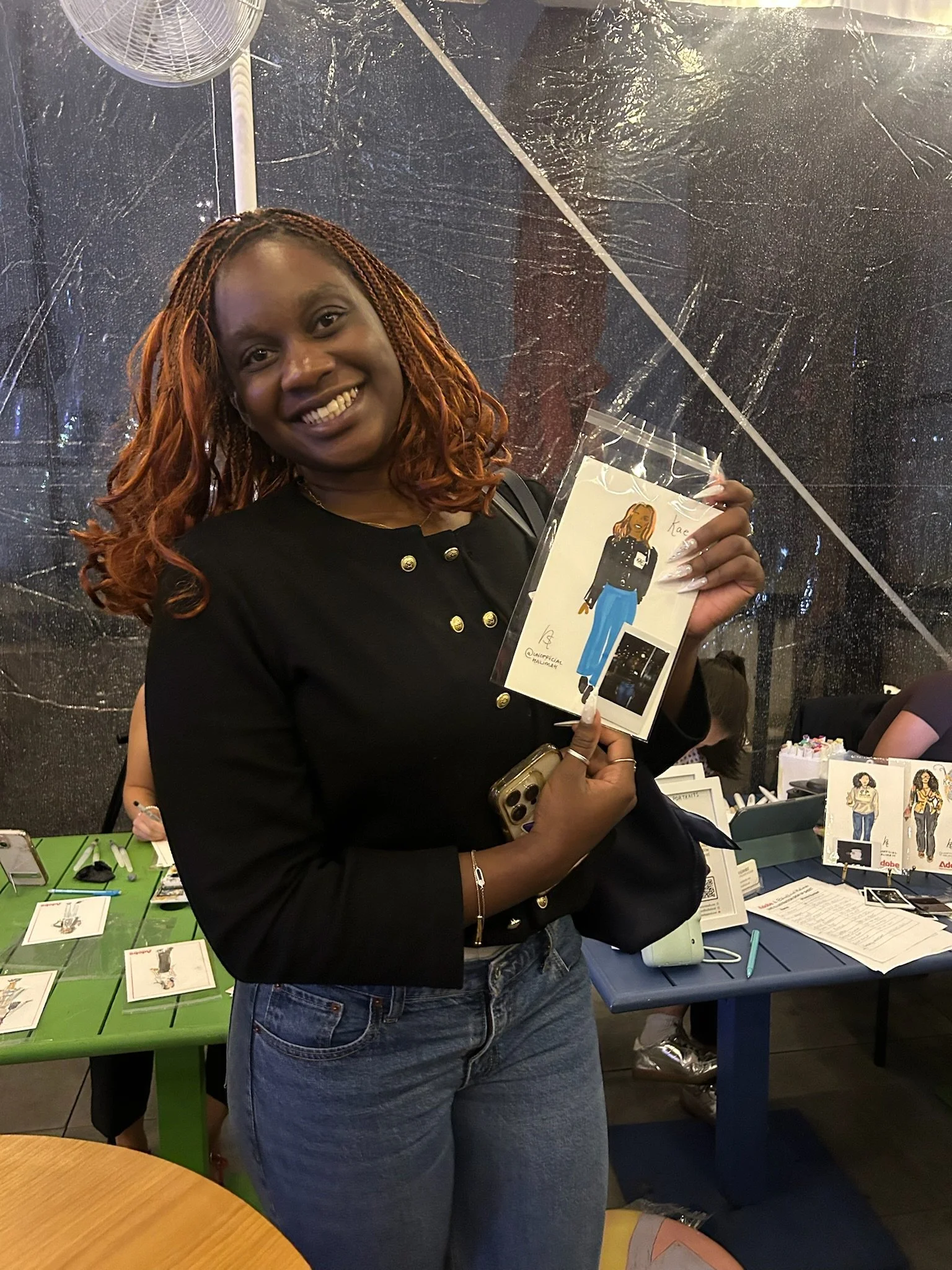 Event guest with their personalized live portrait at an Adobe event in New York City