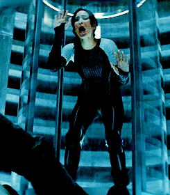 Distressed Katniss Everdeen in tube elevator gif