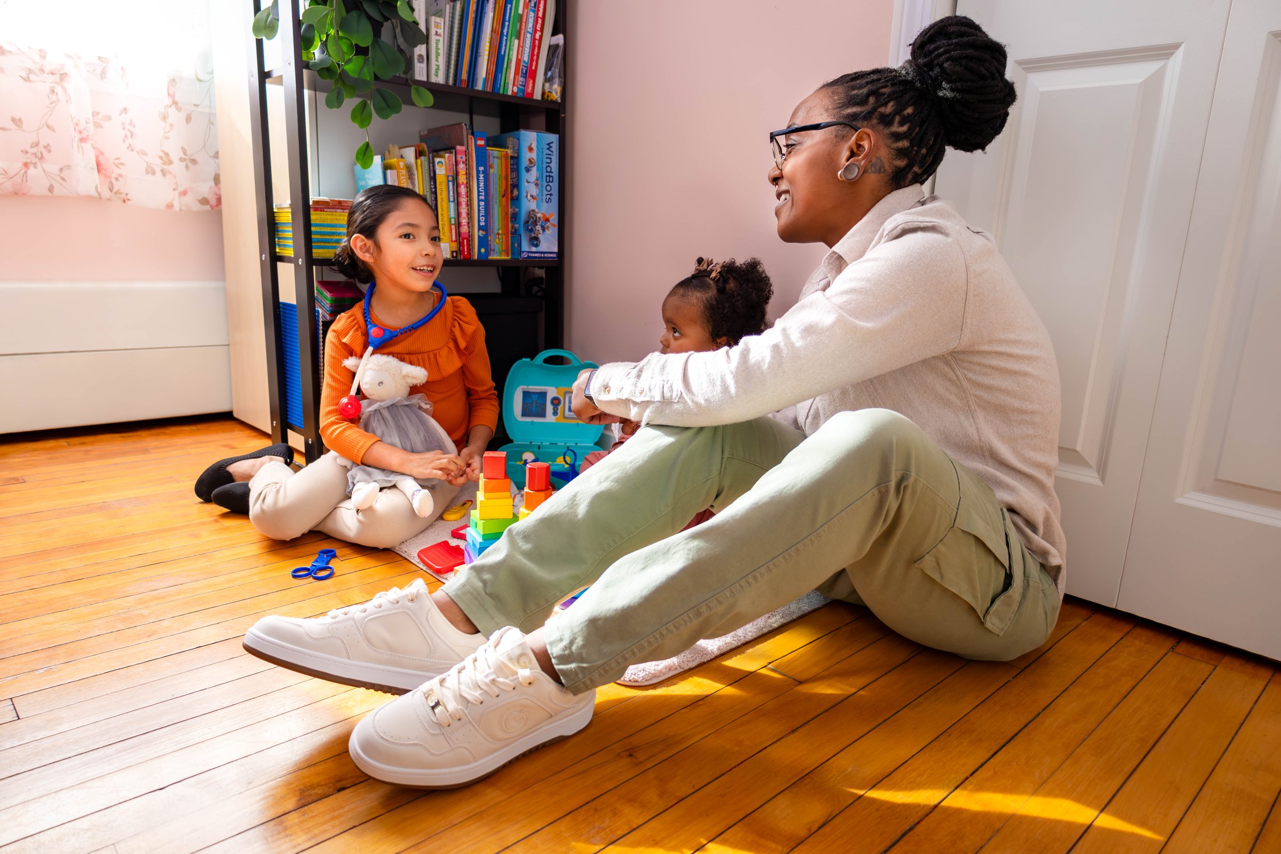 Zoe Calixte - Parent Coach with child providing child life skills.jpg