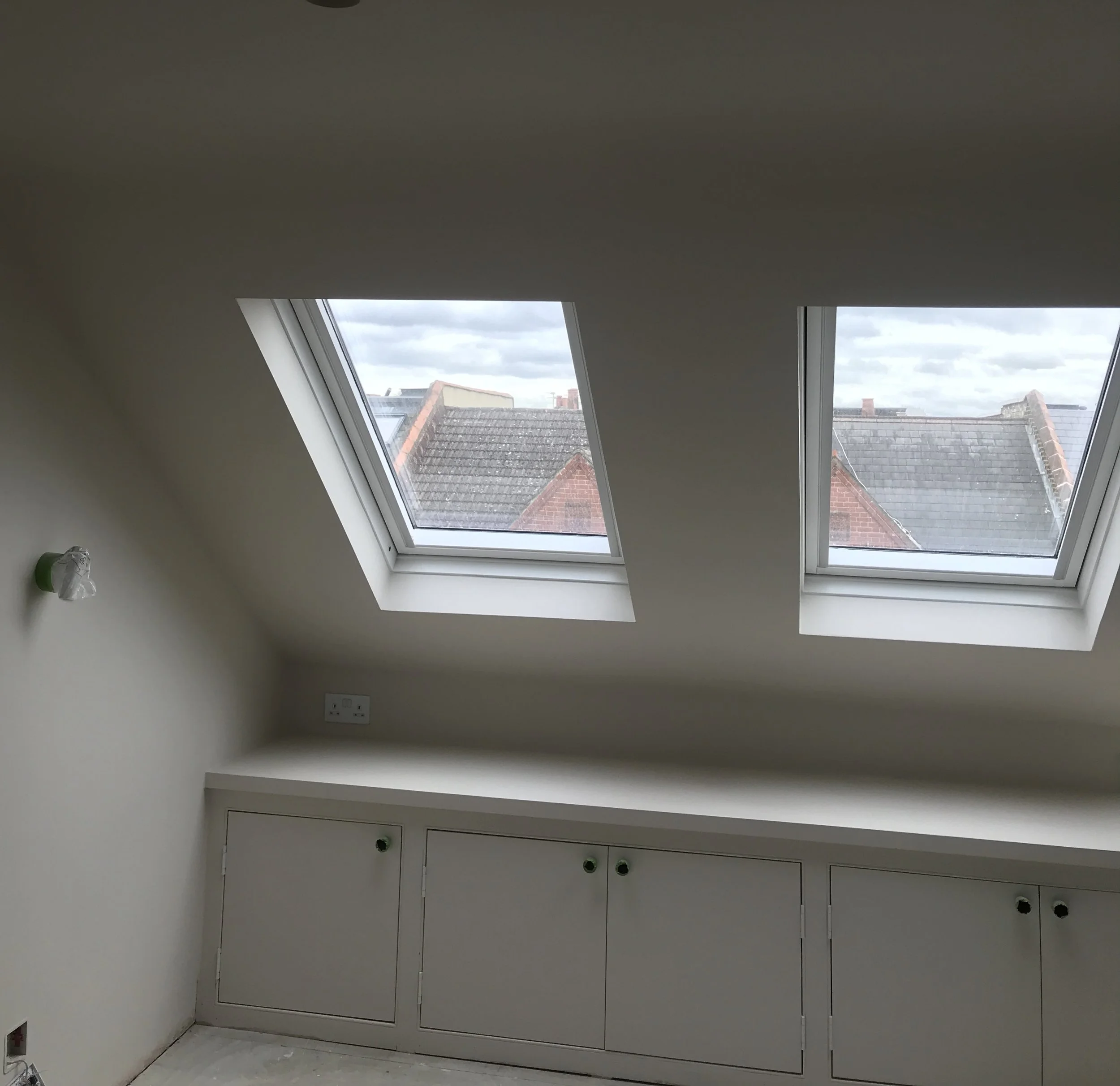 loft-bedroom-storage-after-painted-frames.jpg
