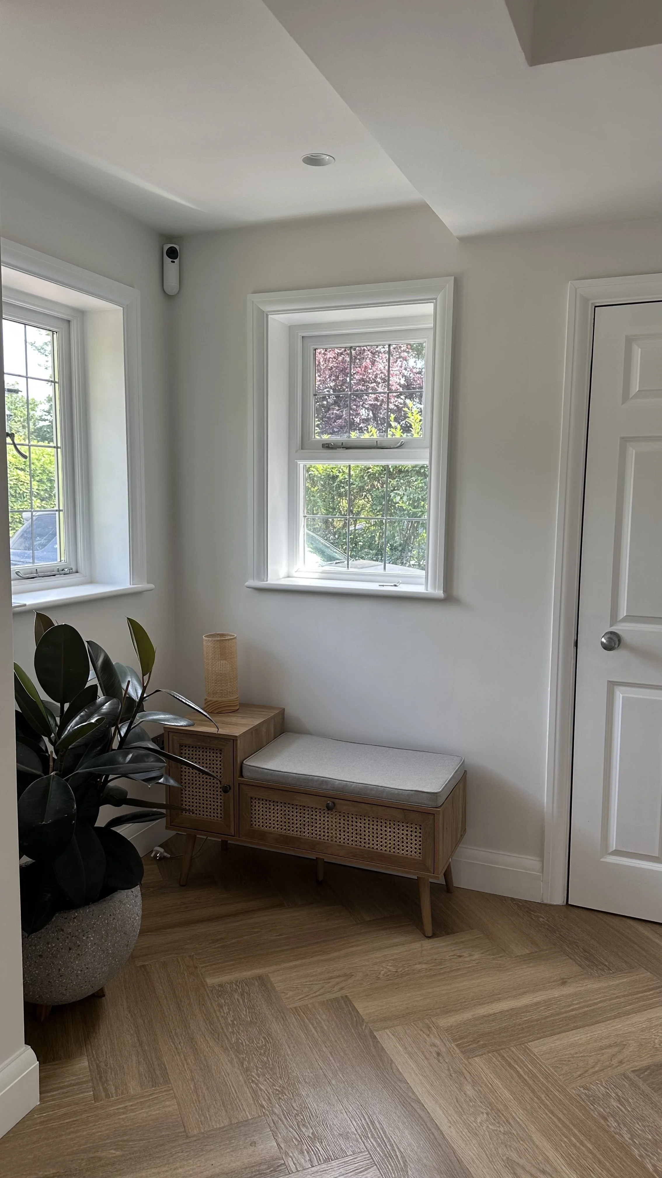 Window bench with underfloor heating and herringbone flooring, Wimbledon interior design