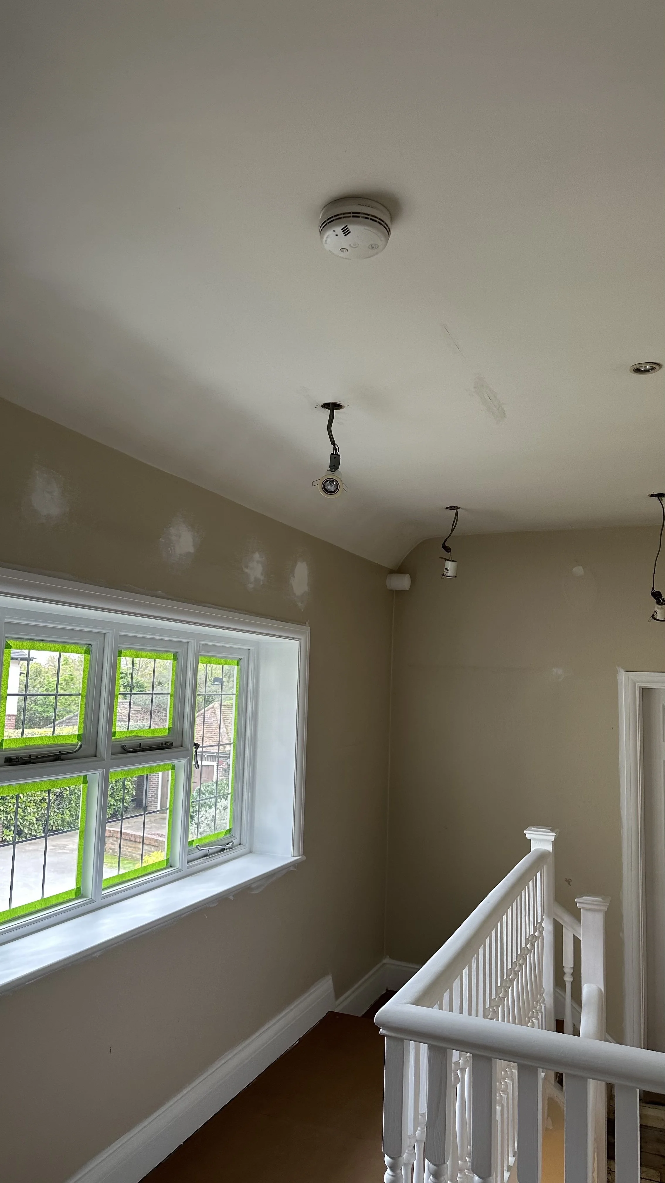 Landing before renovation, dated paintwork and lighting, Wimbledon