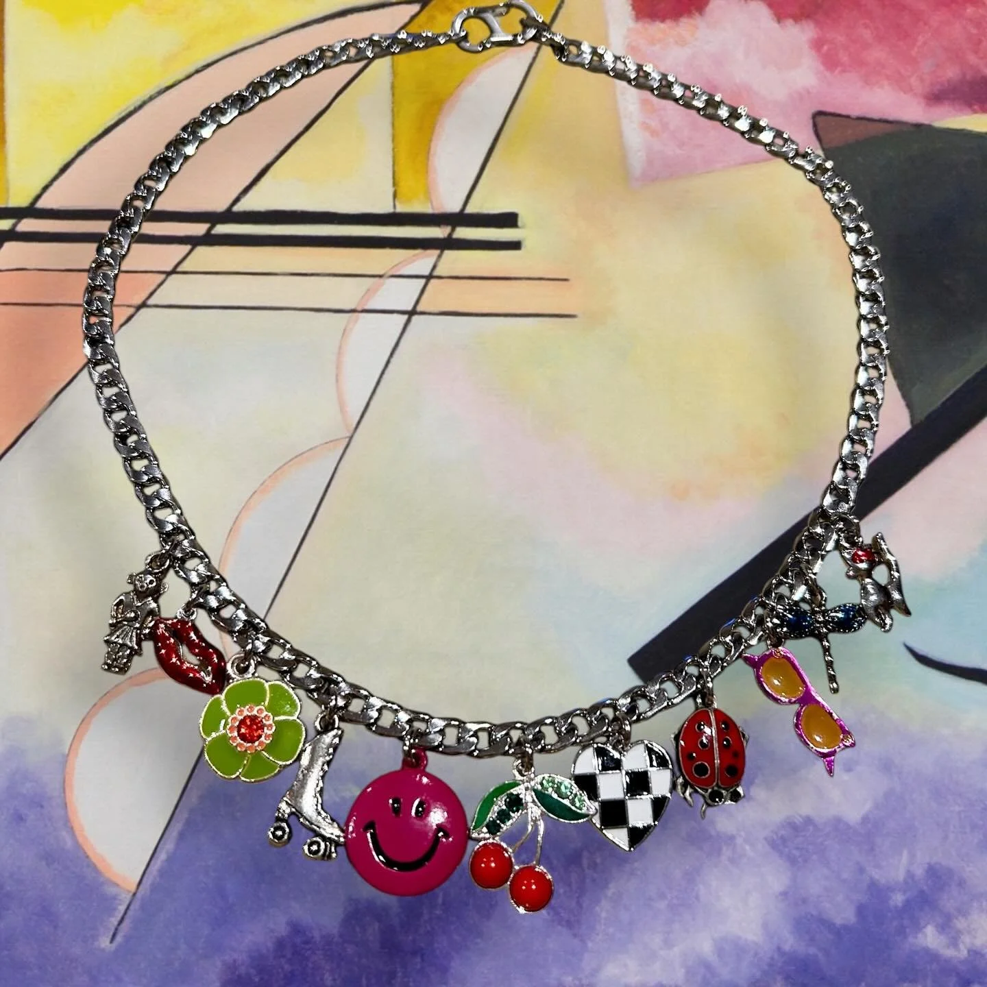 Real necklace. AI backgrounds. 10 year old me in jewelry form. Which is your favorite 80&rsquo;s background look?