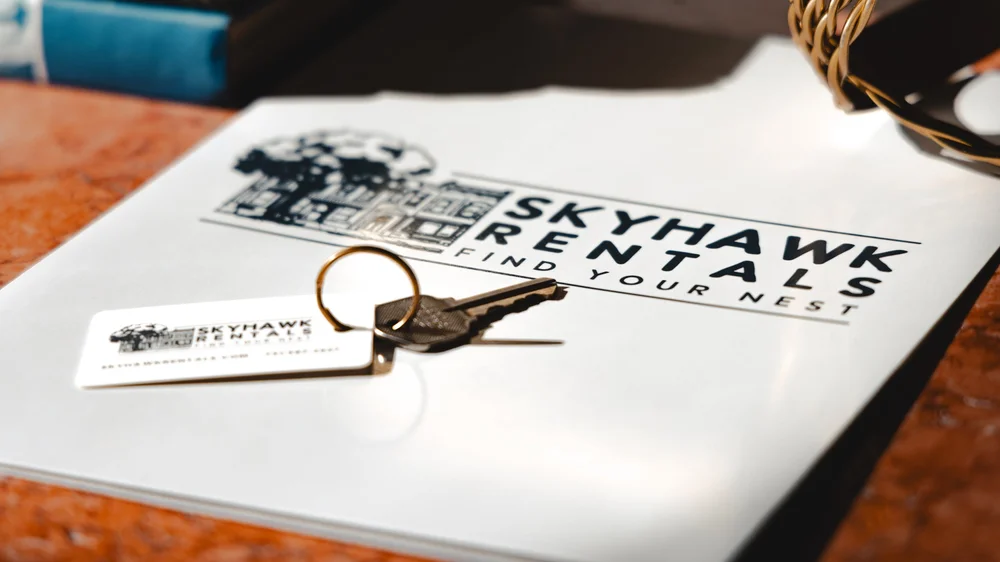 Skyhawk Rentals keys on a folder