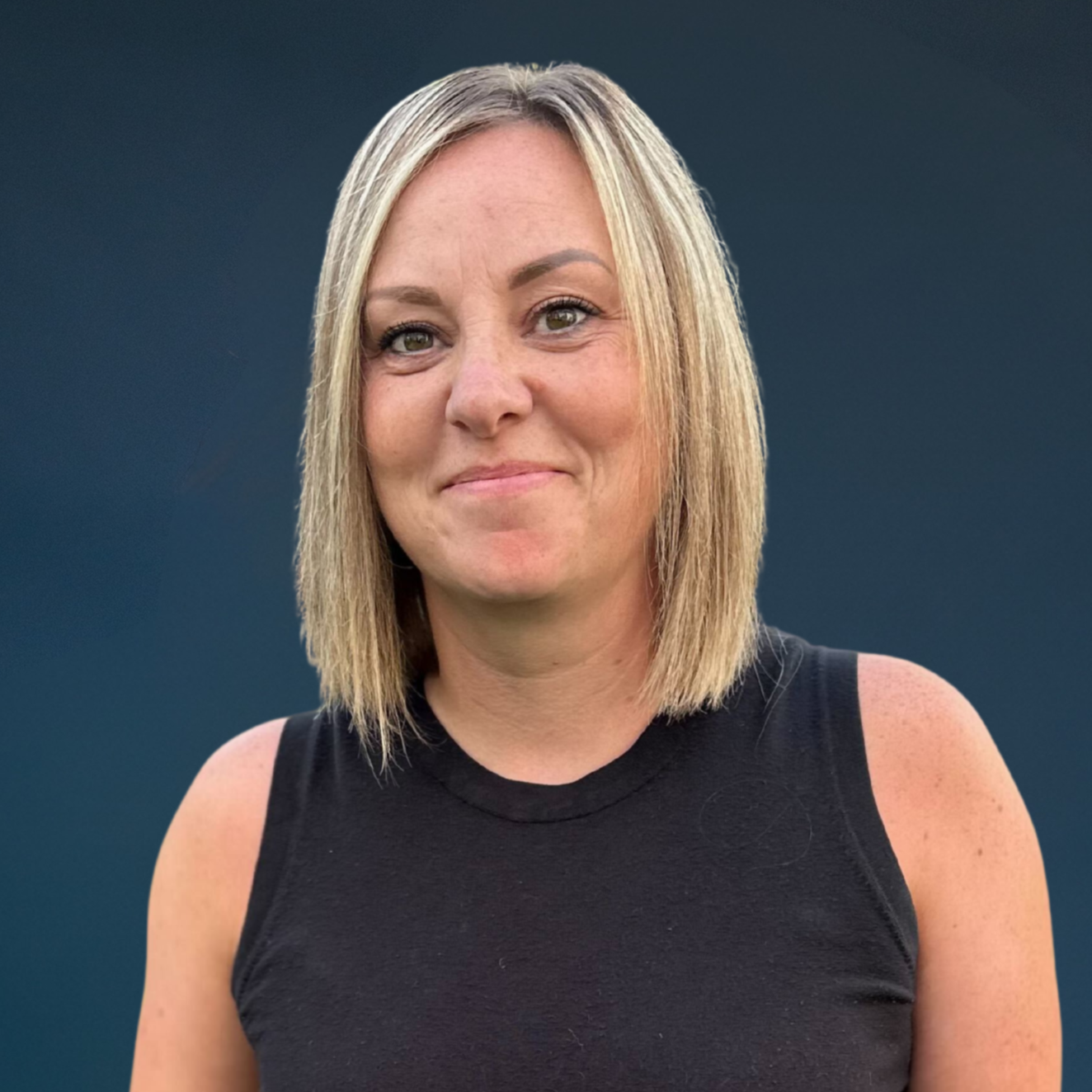 Woman with blonde hair smiling 