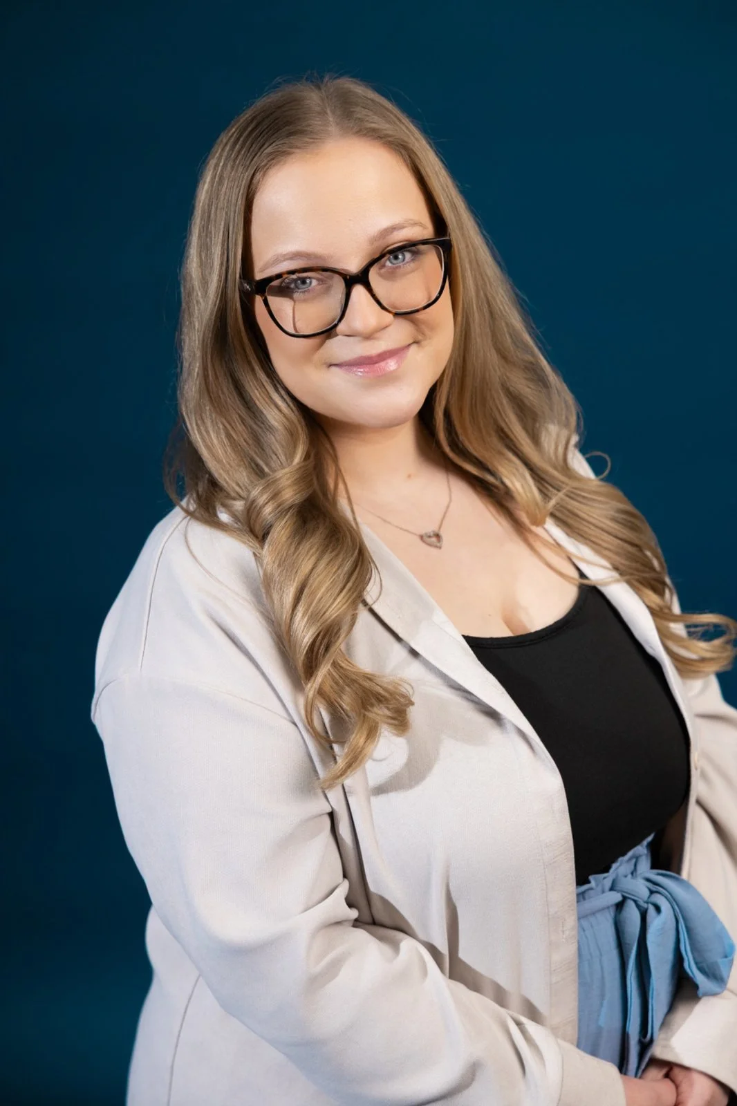 Smiling woman with long blonde hair