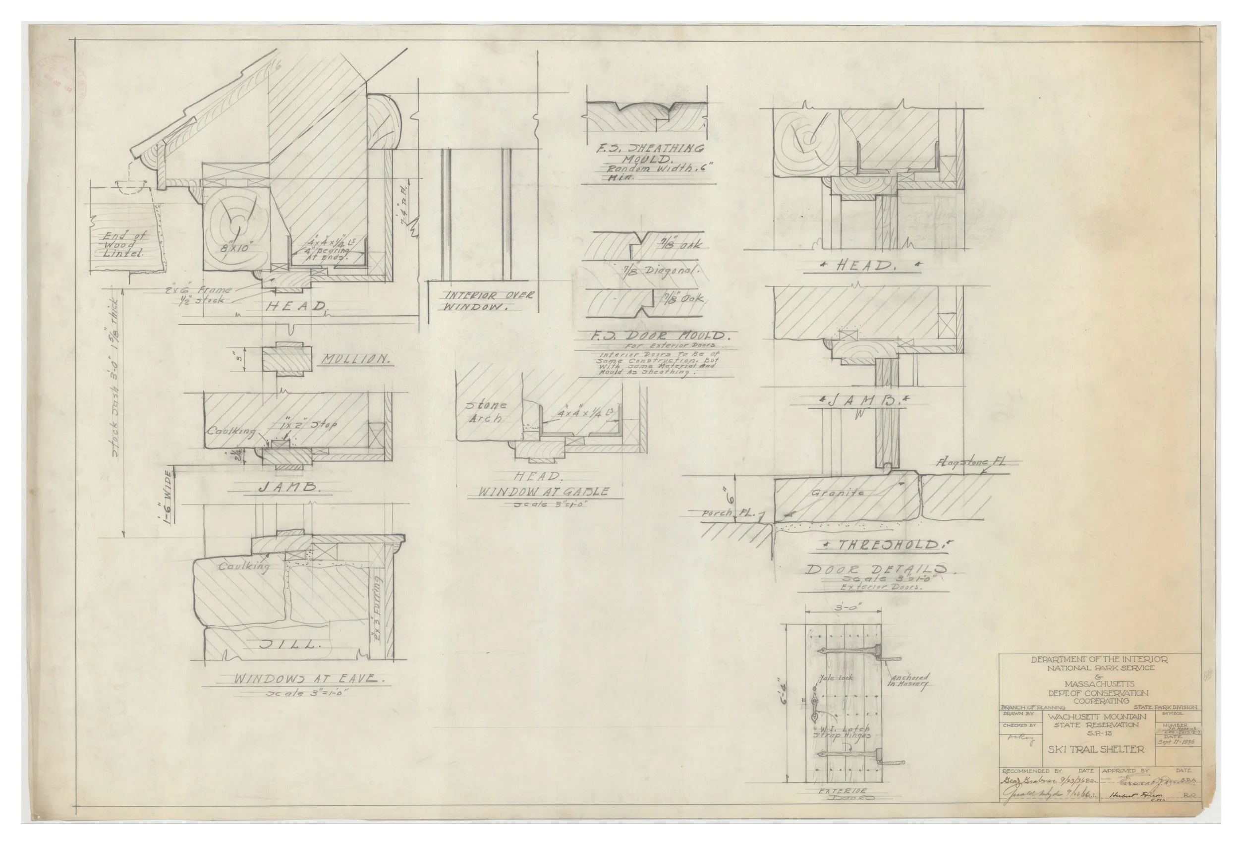 Architectural blueprints or technical drawings on paper, illustrating detailed design plans for a structure or object with various sections and annotations.