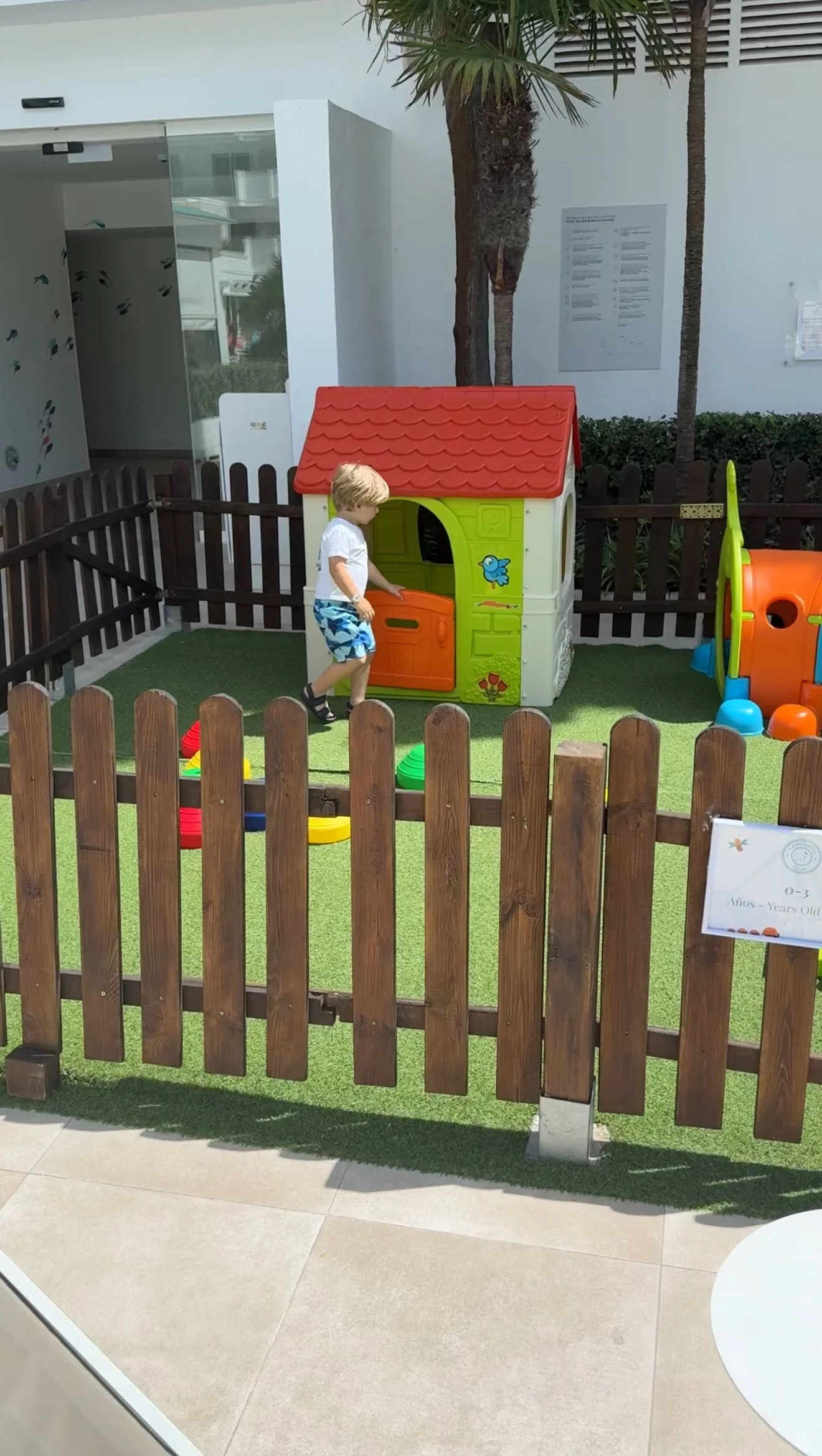 teddy in kids play house .jpeg