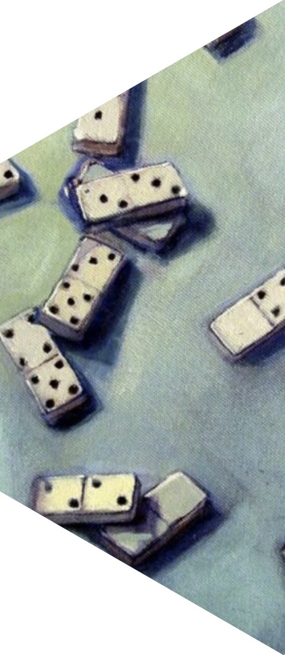 Scattered dominoes lying on a textured surface