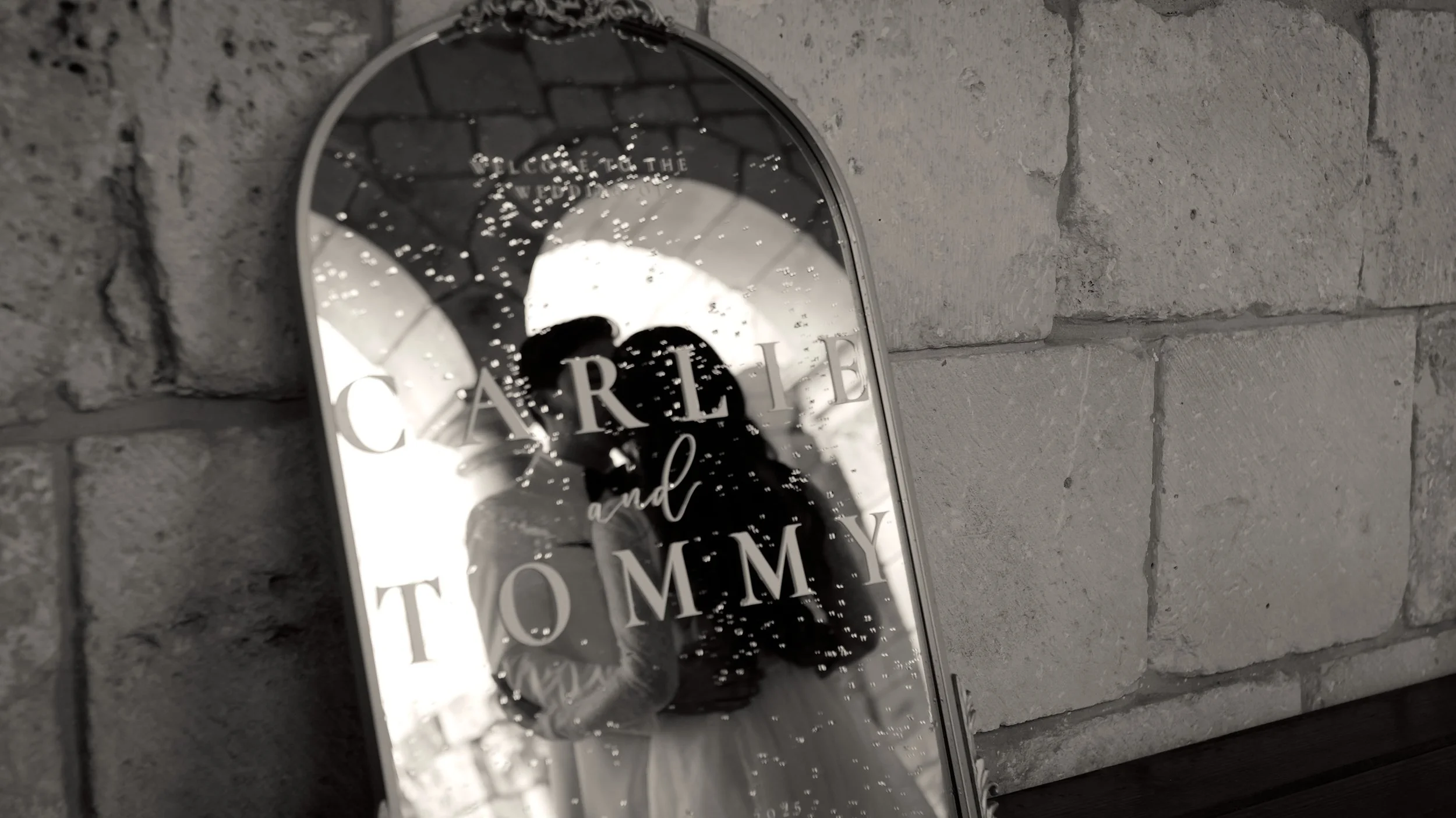 A wedding reception table landscape with candles, florals, moody vibes. 
