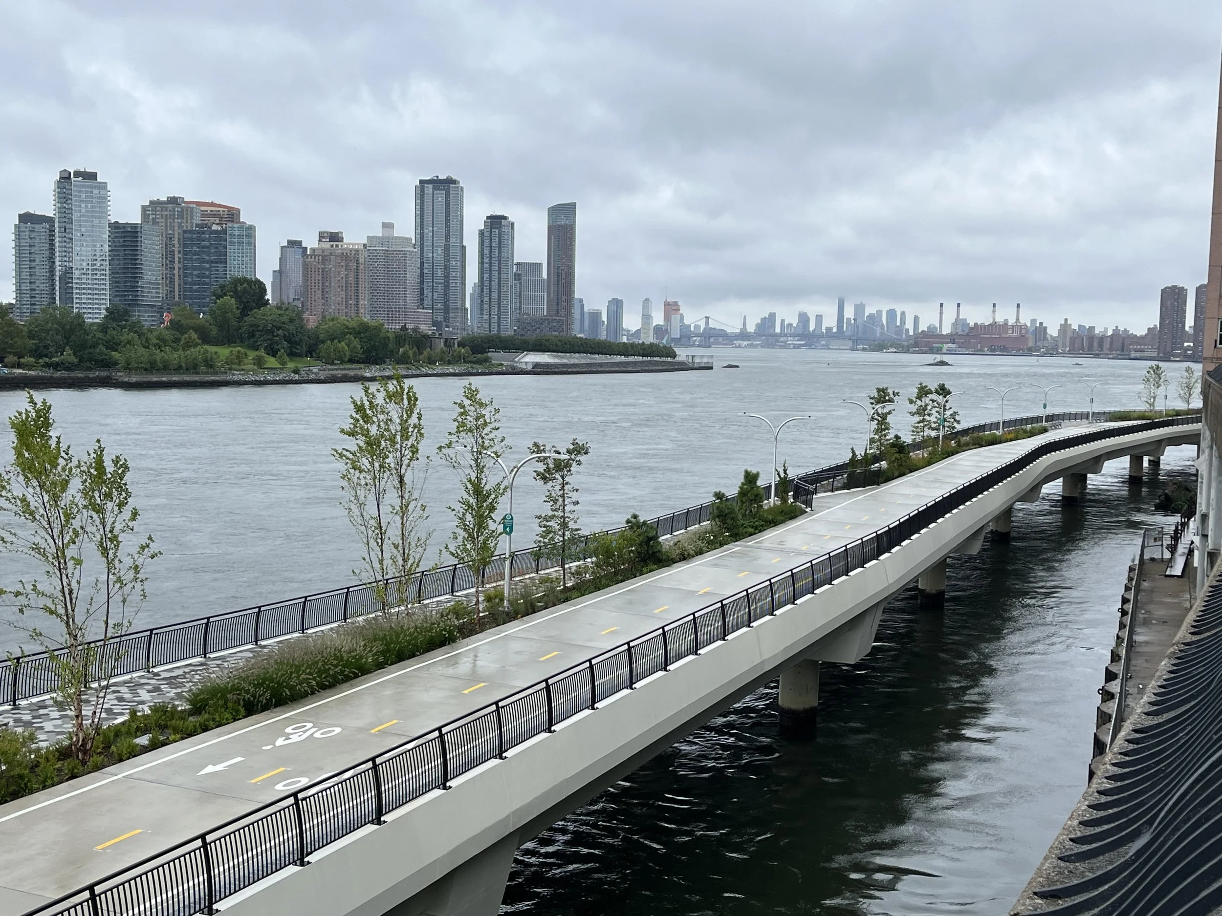City in the background with a bike path in the foreground.