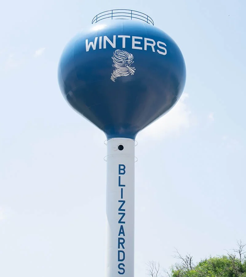 Winters, Texas water tower representing the local community served by North Runnels Hospital District