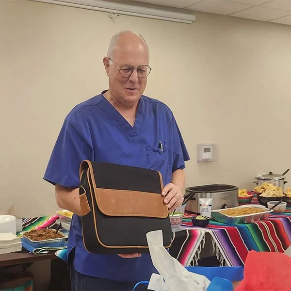 North Runnels Hospital staff member participating in an employee appreciation gathering and community-focused hospital event.