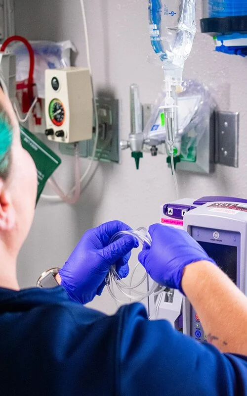 North Runnels Hospital staff member preparing IV equipment for patient care in Winters, Texas.
