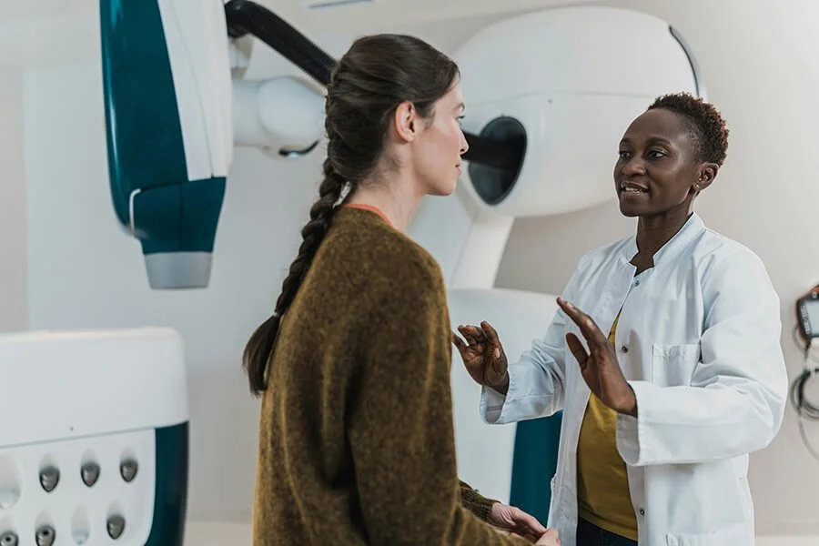 Healthcare provider offering personalized medical care and patient support in a clinical setting