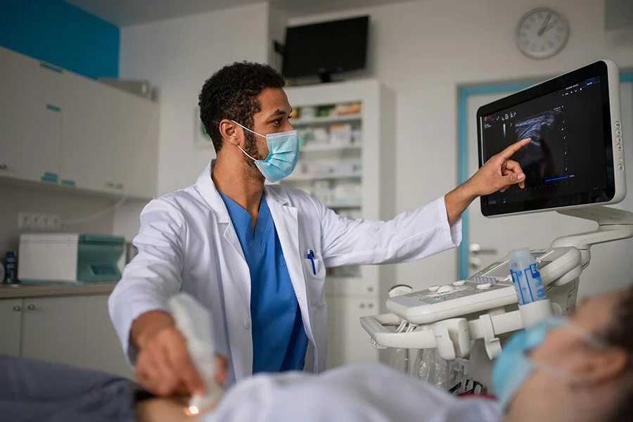 Healthcare provider performing an ultrasound exam, representing diagnostic ultrasound services at North Runnels Hospital District.