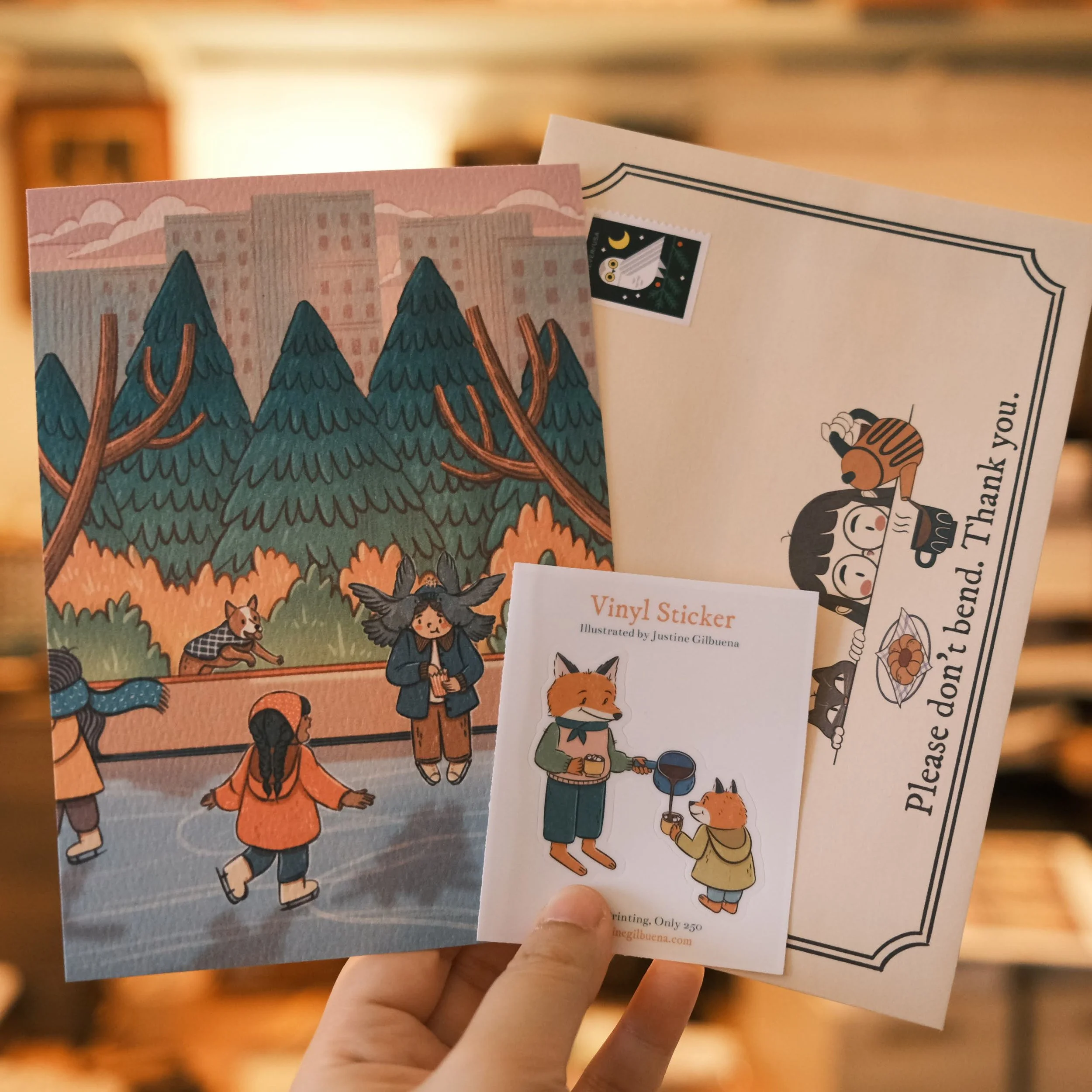 Feb 2025: Ice Rink Postcard and Cocoa Fox Sticker 