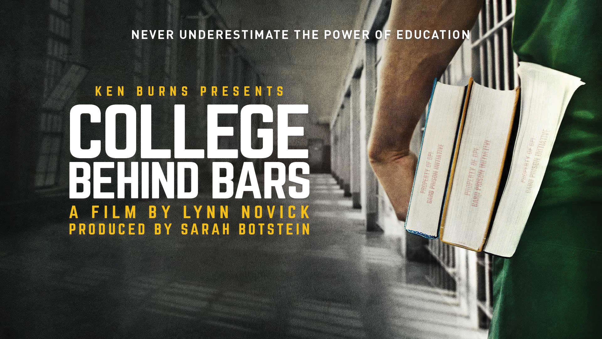 Close-up of a person wearing a green shirt holding a few books behind bars in a juvenile detention center, with barred cells in the background.