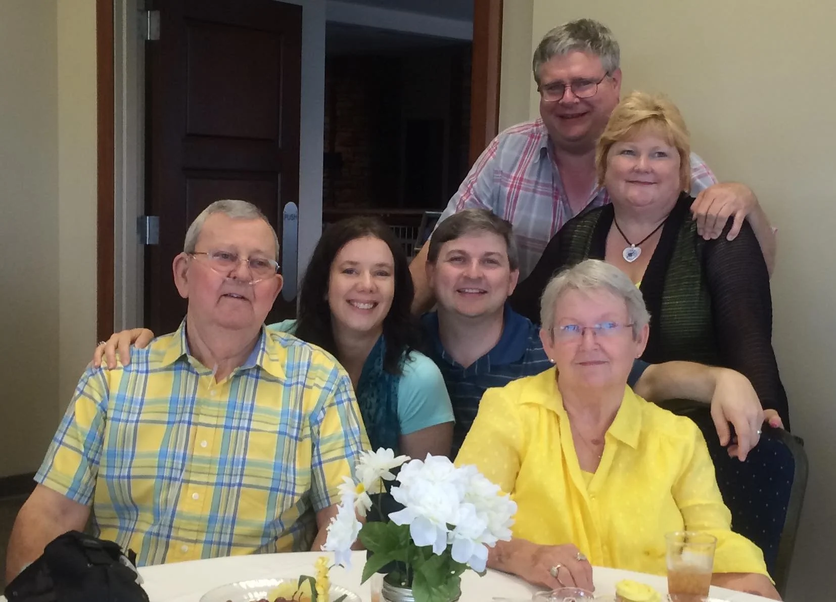 It took me a while to find a photo of Clay Campbell. Not because I didn’t see him often. Clay was as dependable as the sunrise. If you needed him, he was there. But Clay (as in this photo) preferred to stay in the background. He was quiet, and